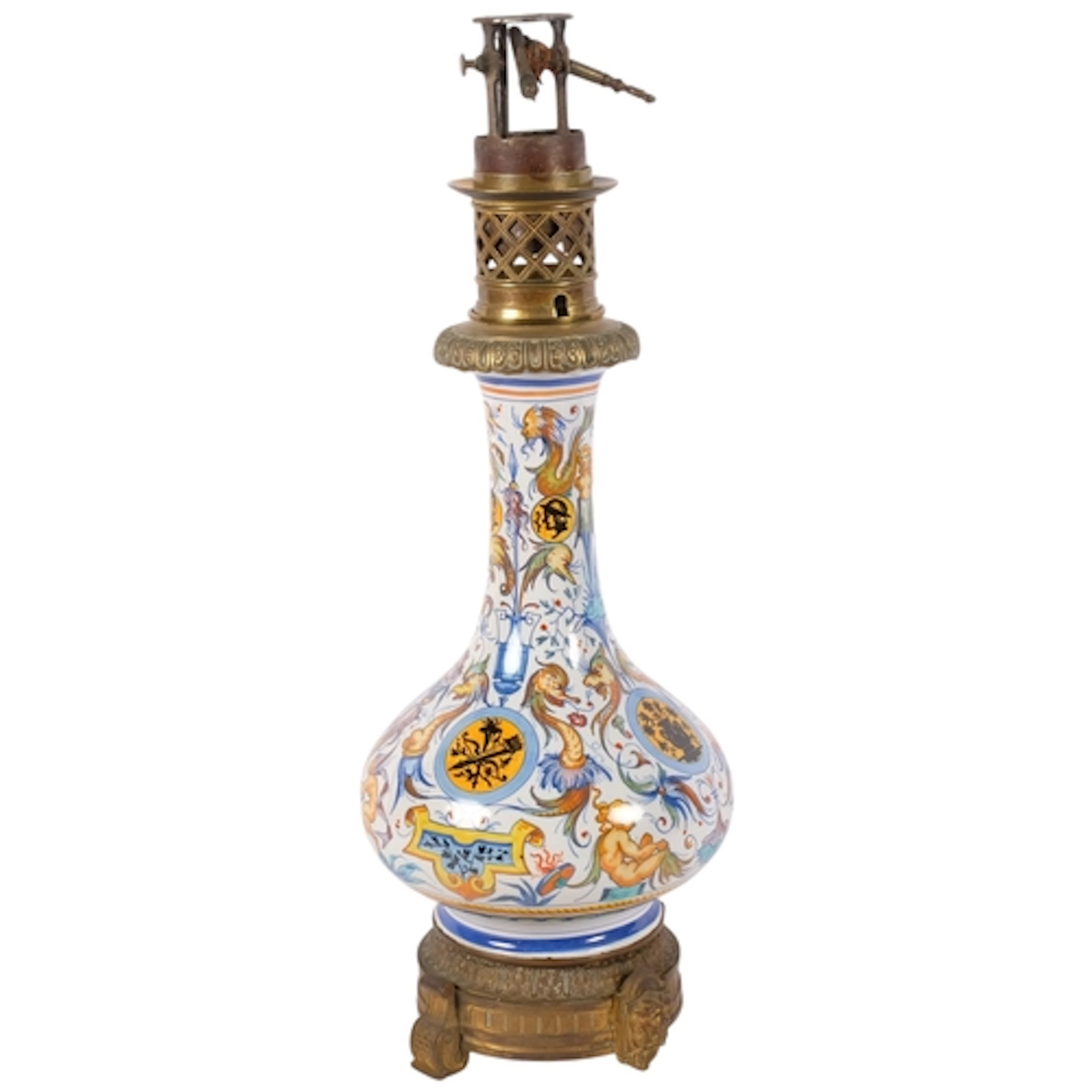 A 19th century French Majolica pottery oil lamp with brass m...