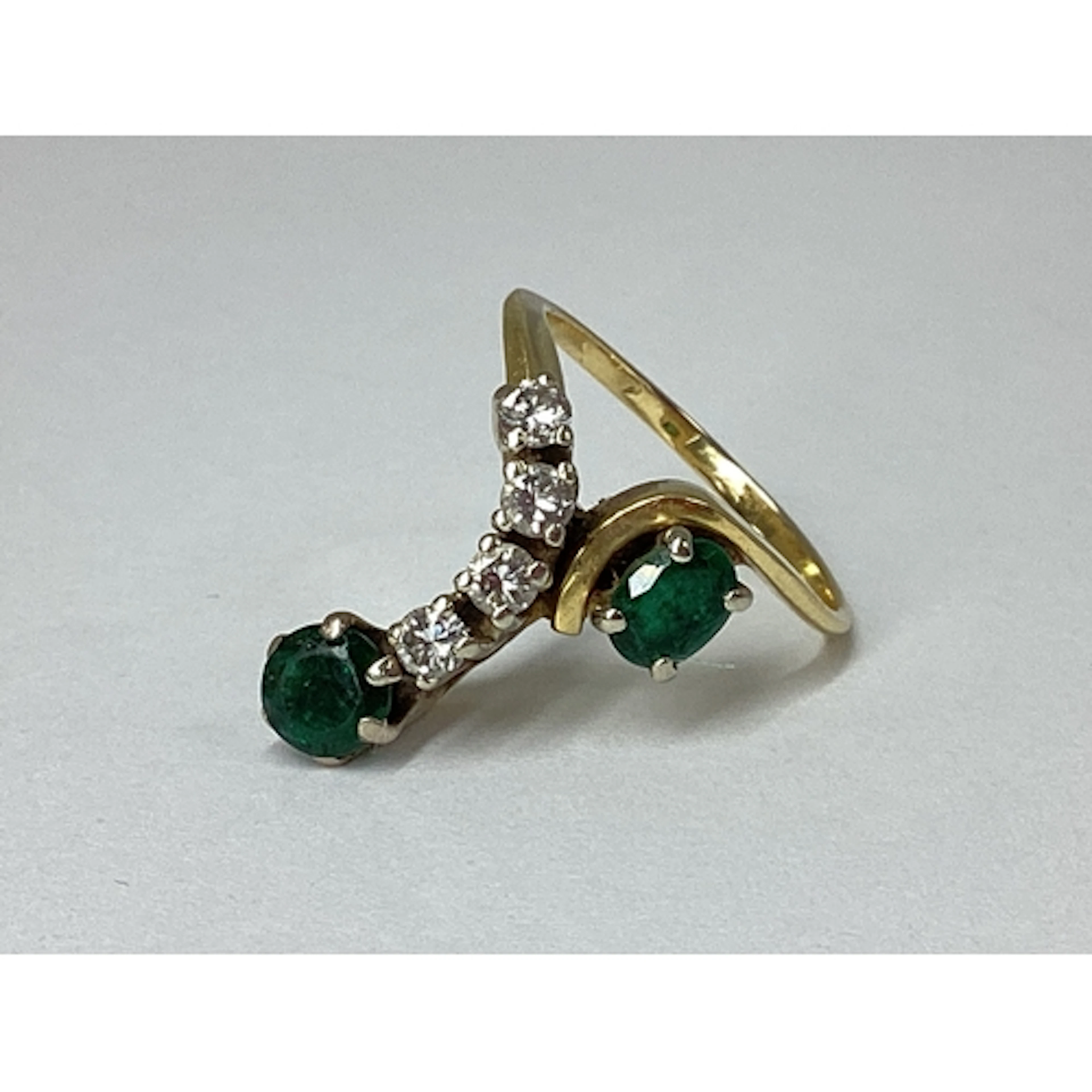 An Unusual Diamond Set Dress Ring, high claw set throughout,...