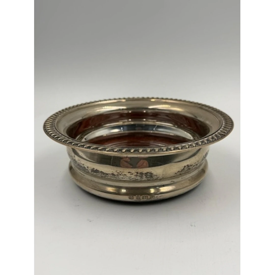 Silver wine bottle coaster, hallmarked for Birmingham 1995 b...