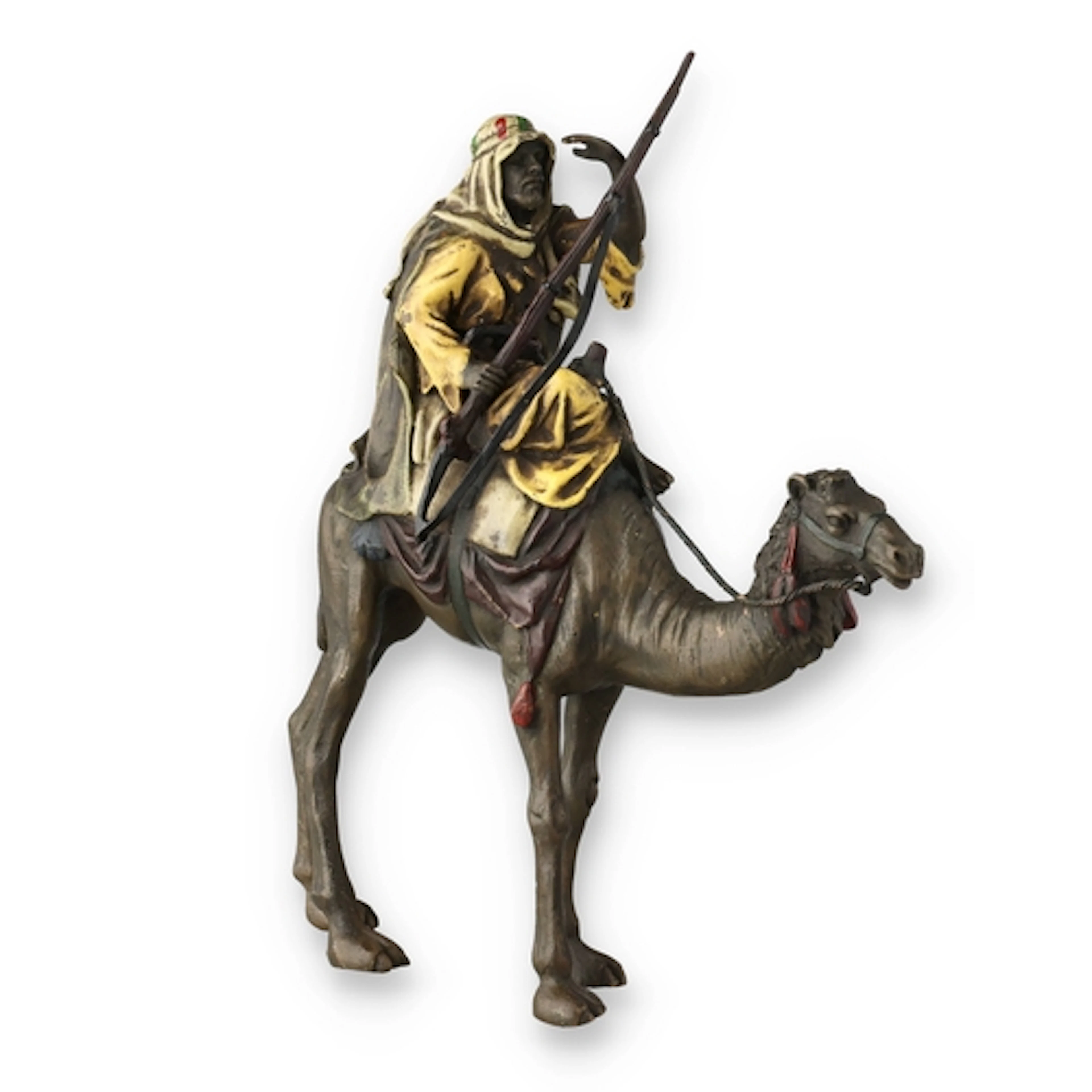 A COLD-PAINTED FIGURAL BRONZE Depcting a man on a camel. 20c...