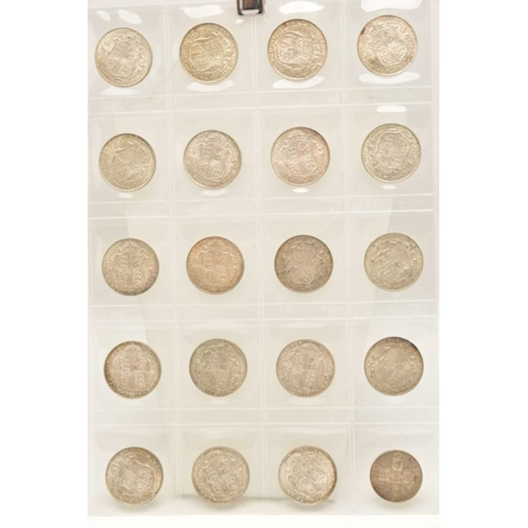 Silver. A page from a coin album containing 19 x King George...