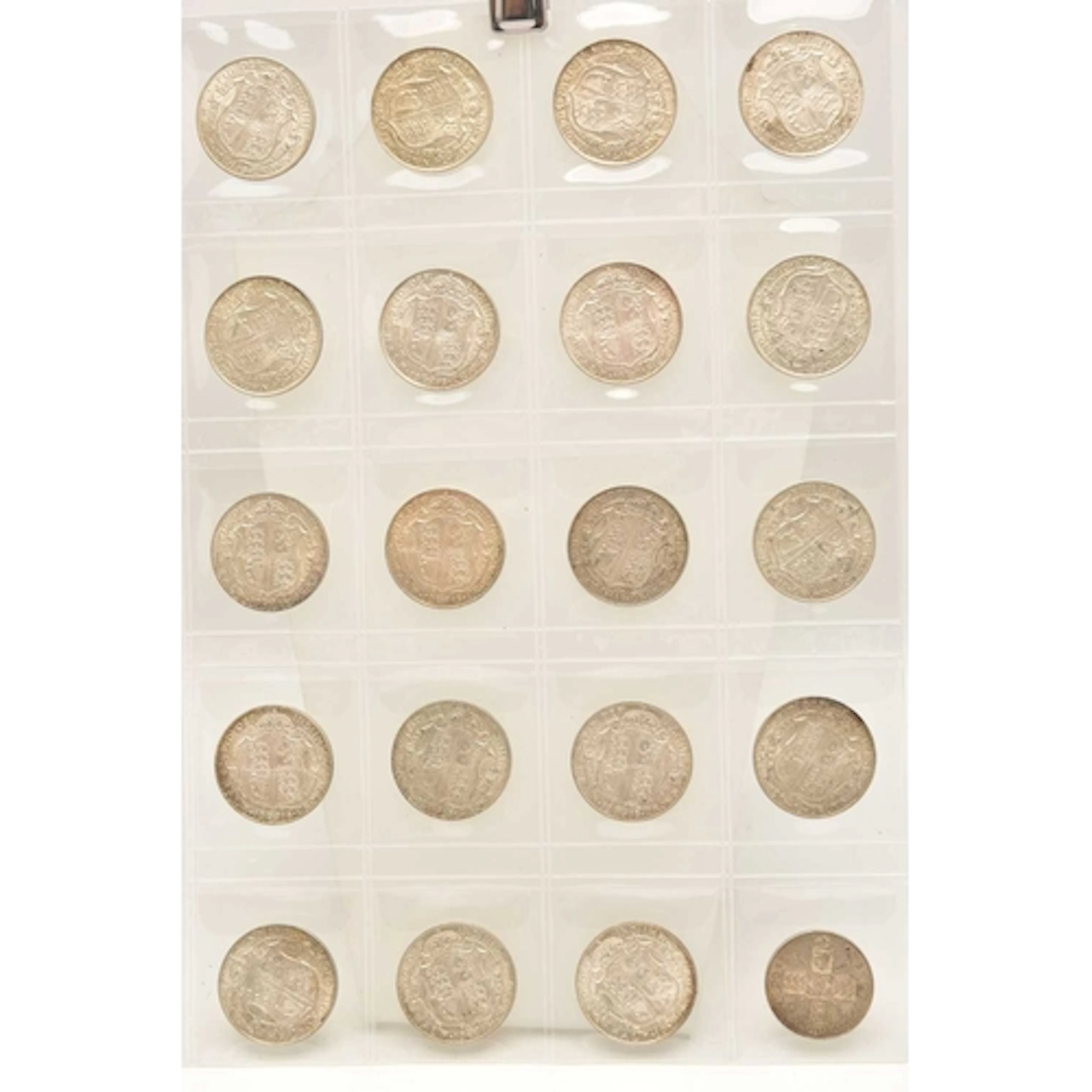 Silver. A page from a coin album containing 19 x King George...