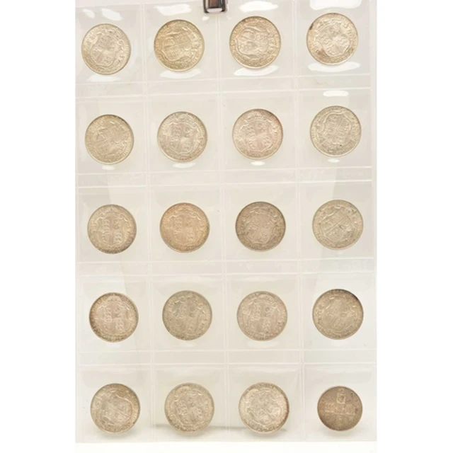 Silver. A page from a coin album containing 19 x King George...