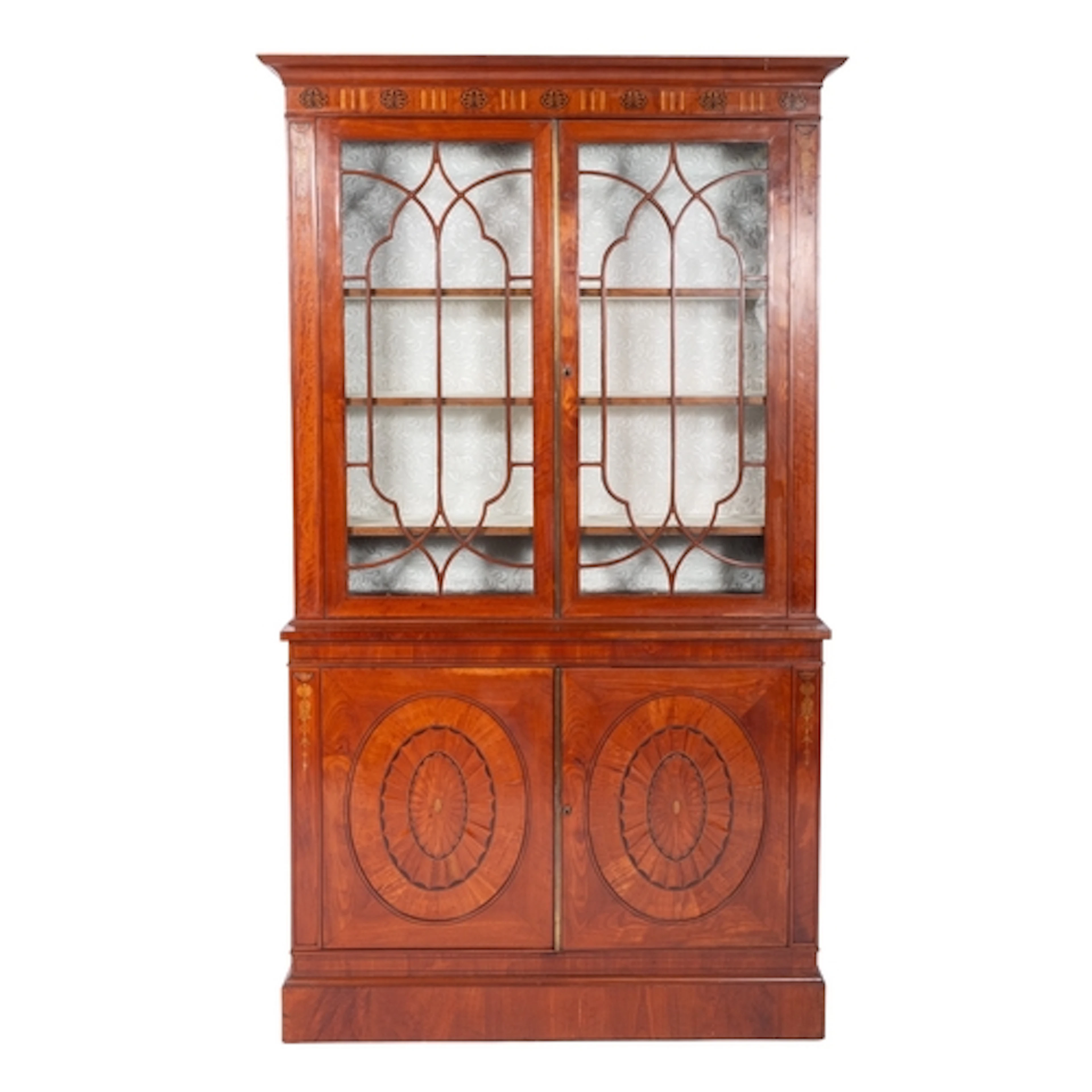 An early 19th century satinwood and marquetry bookcase, the ...