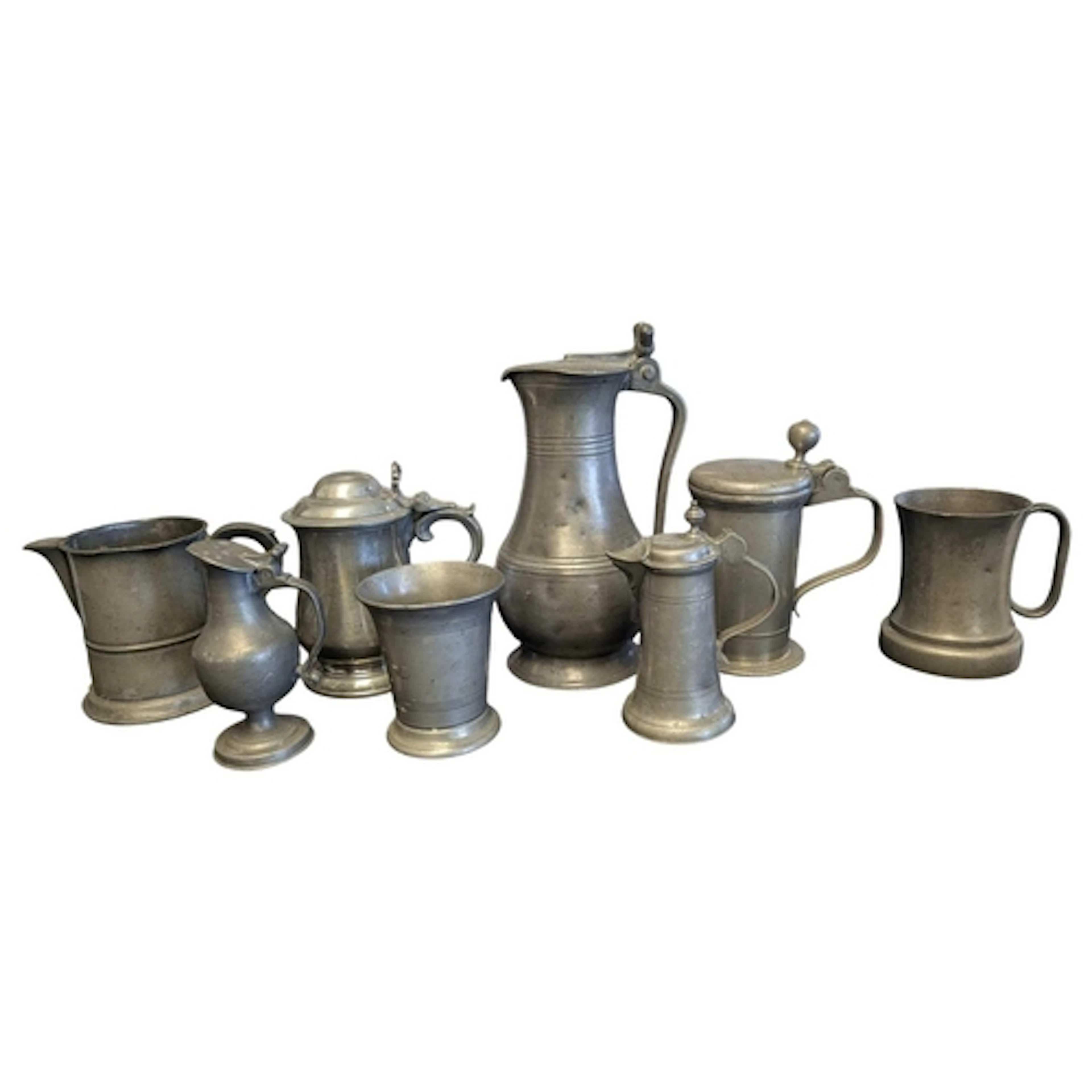 Collection of 18th and 19th century pewter tankards and jugs...