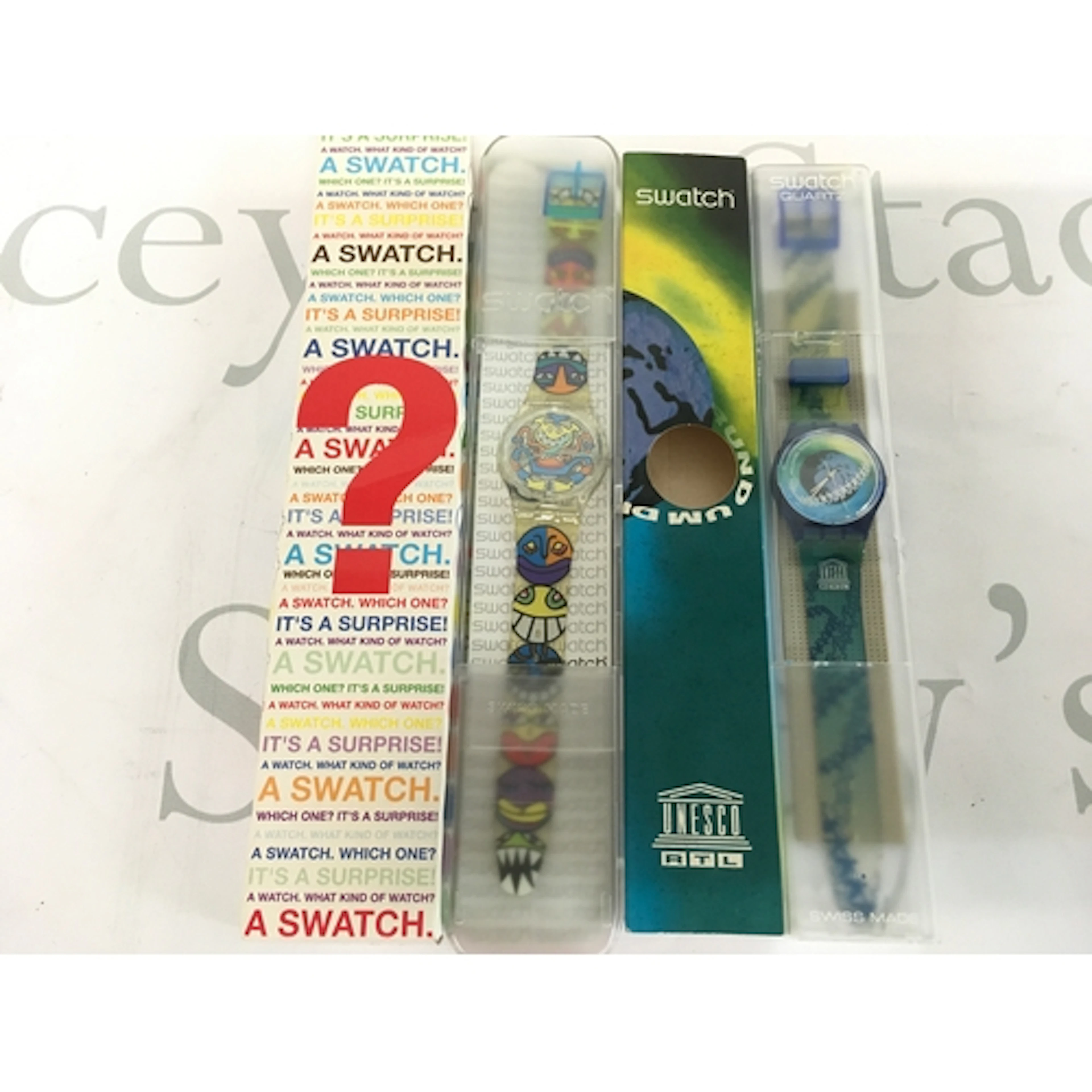 Two Swatch watches includes the 1995 "Swatch Special UNlimit...