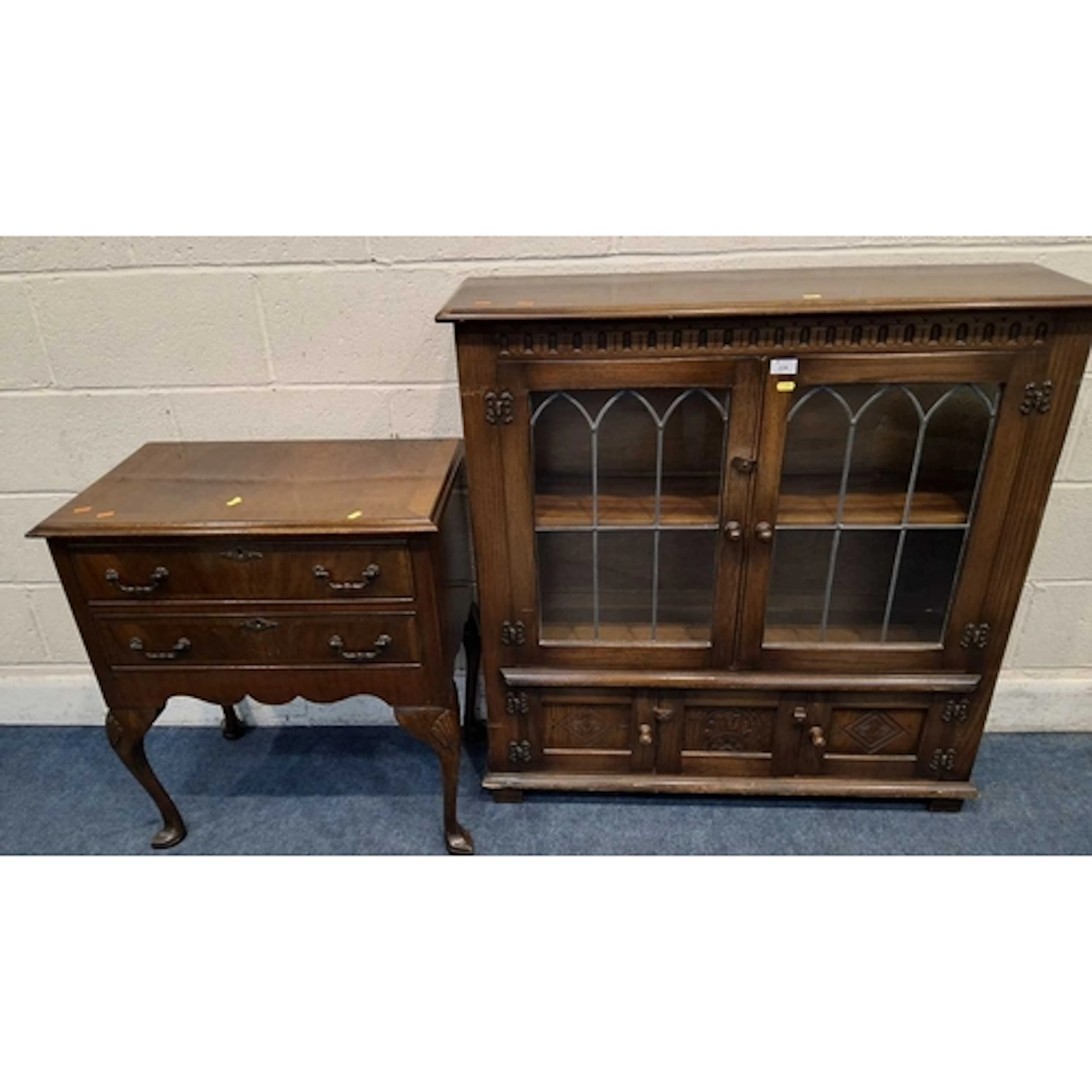 A 20TH CENTURY OAK BOOKCASE, the double lead glazed doors en...