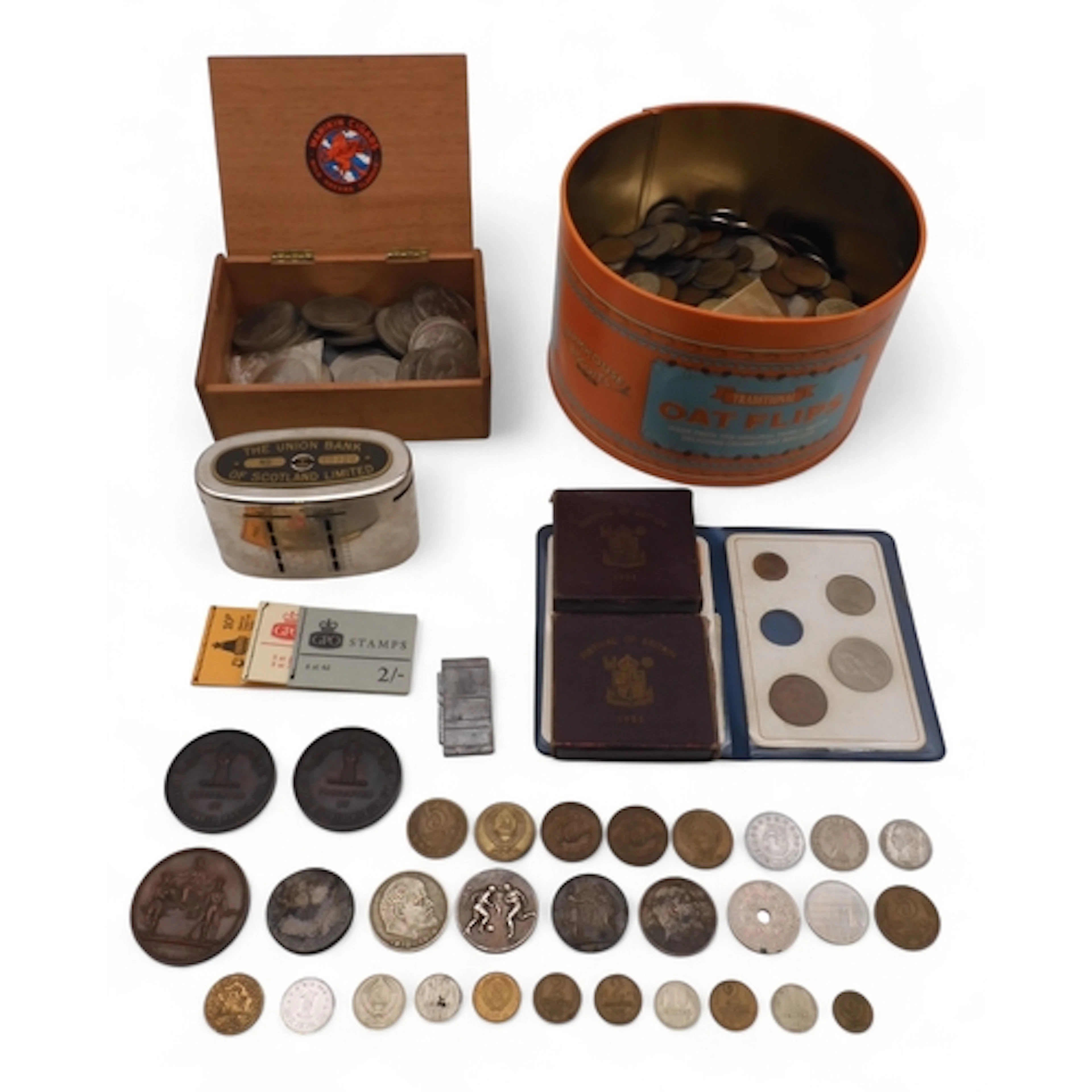 A lot of worldwide coins, tokens and medals to include lives...