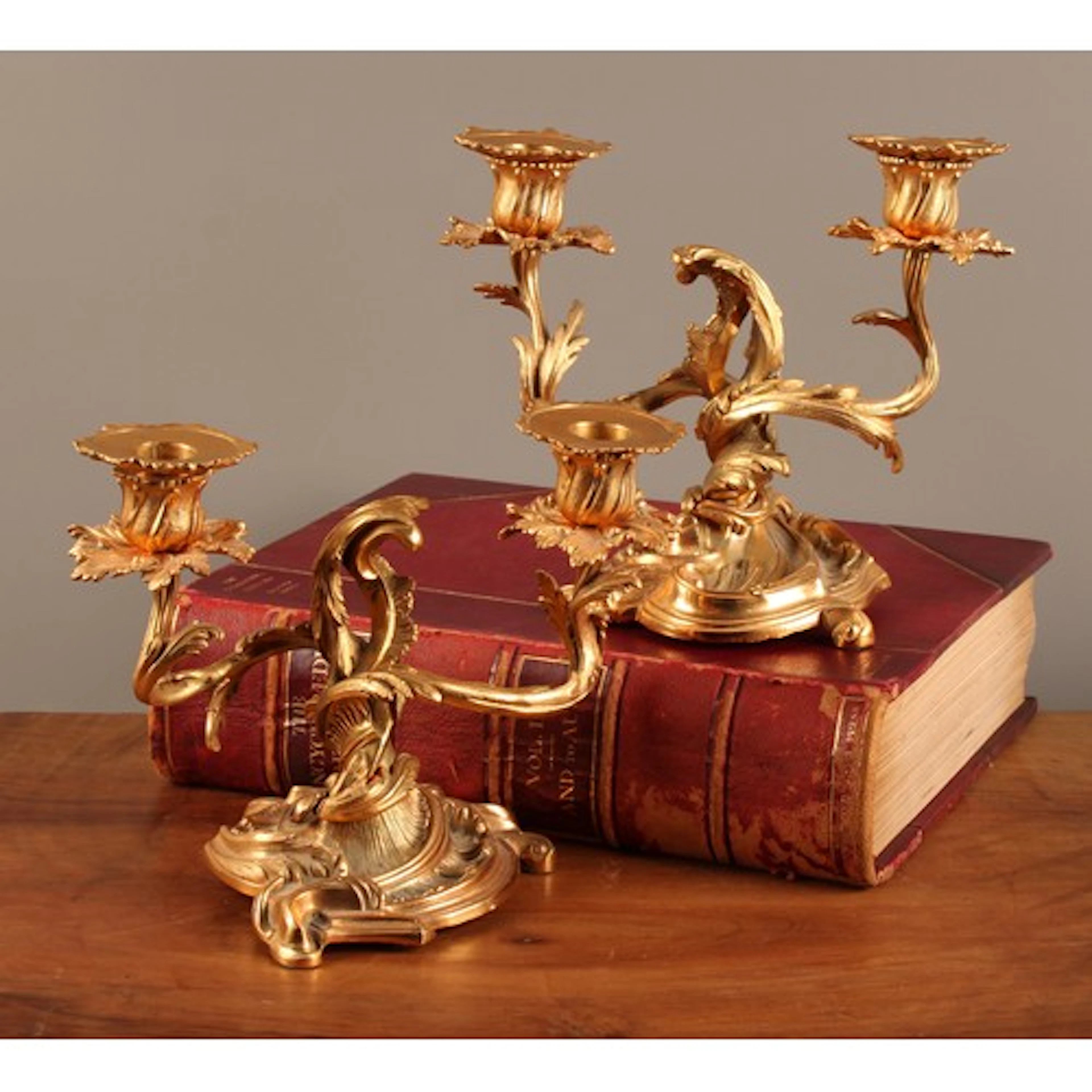 A pair of Louis XV style French ormolu two branch candelabra...