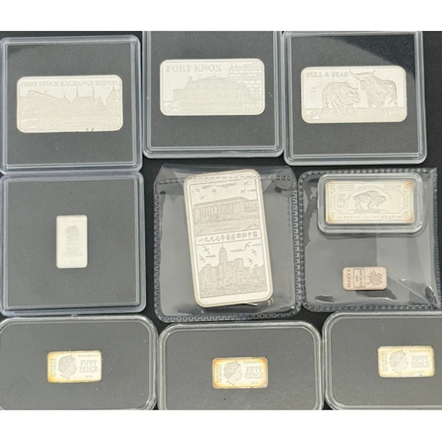 A group of ten silver coin ingots and bars, comprising Jerse...
