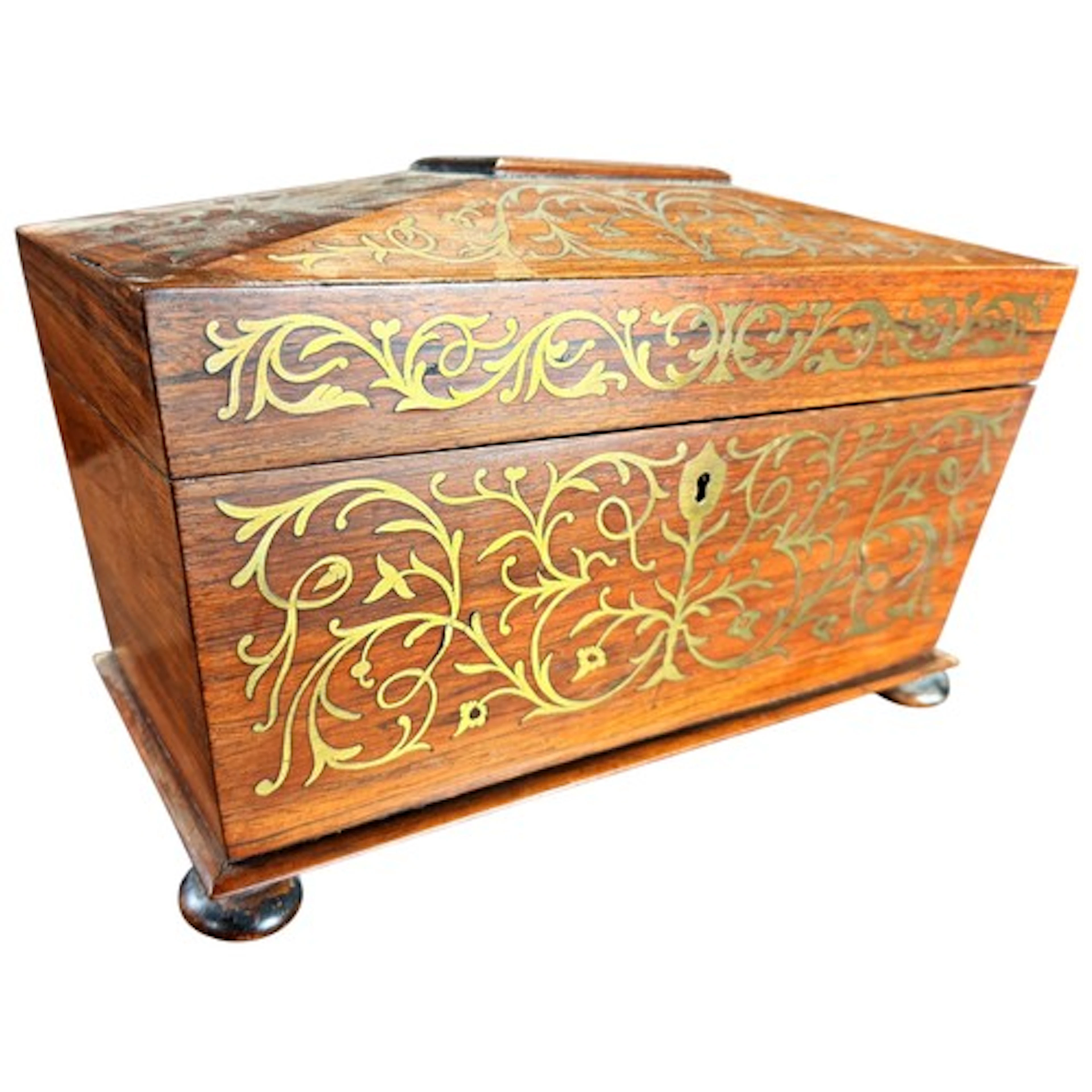 A Regency brass inlaid rosewood sarcophagus shaped tea caddy...