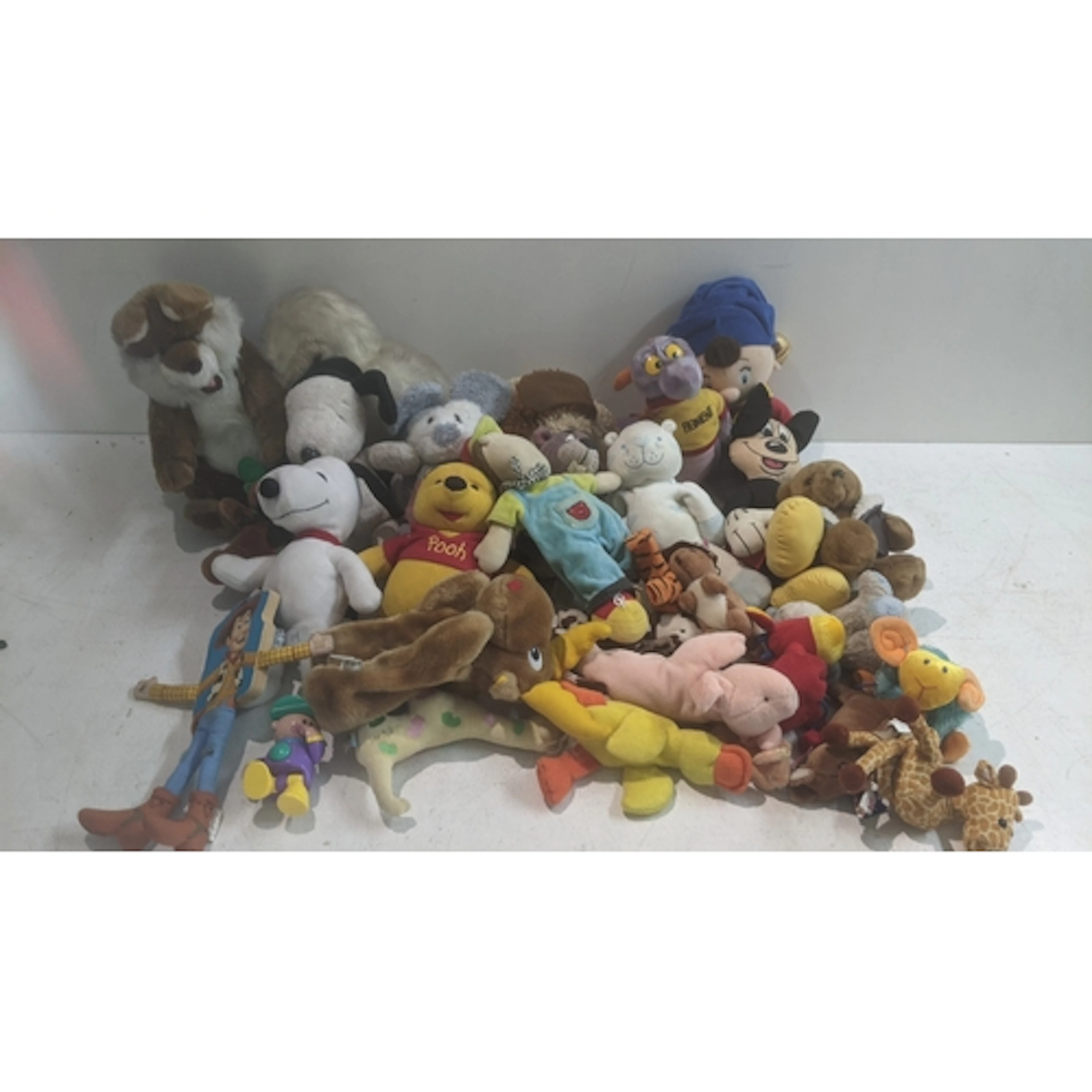 A collection of stuffed toys to include Gopher from Winnie T...