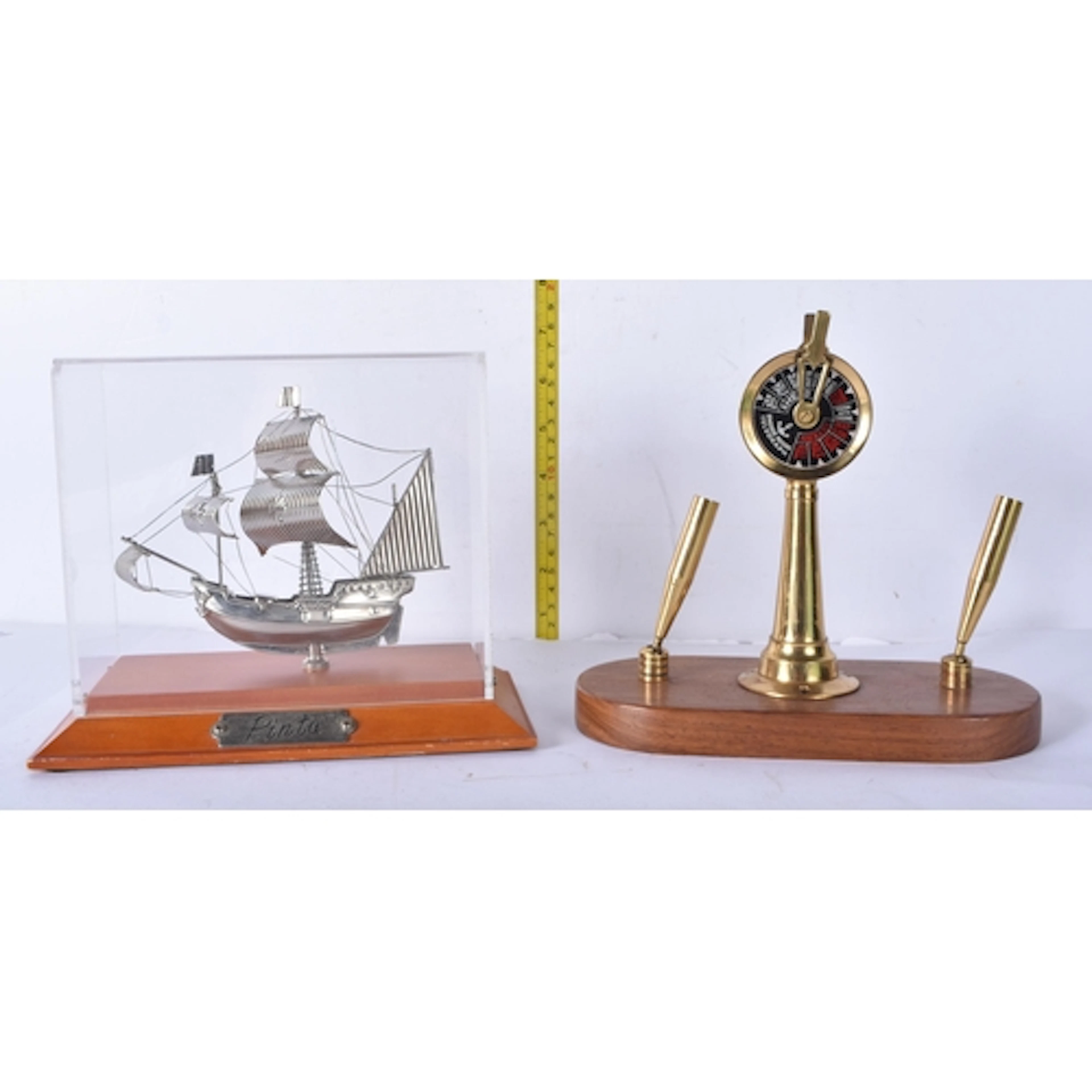 A marine themed Telegraph brass pen holder together with a c...