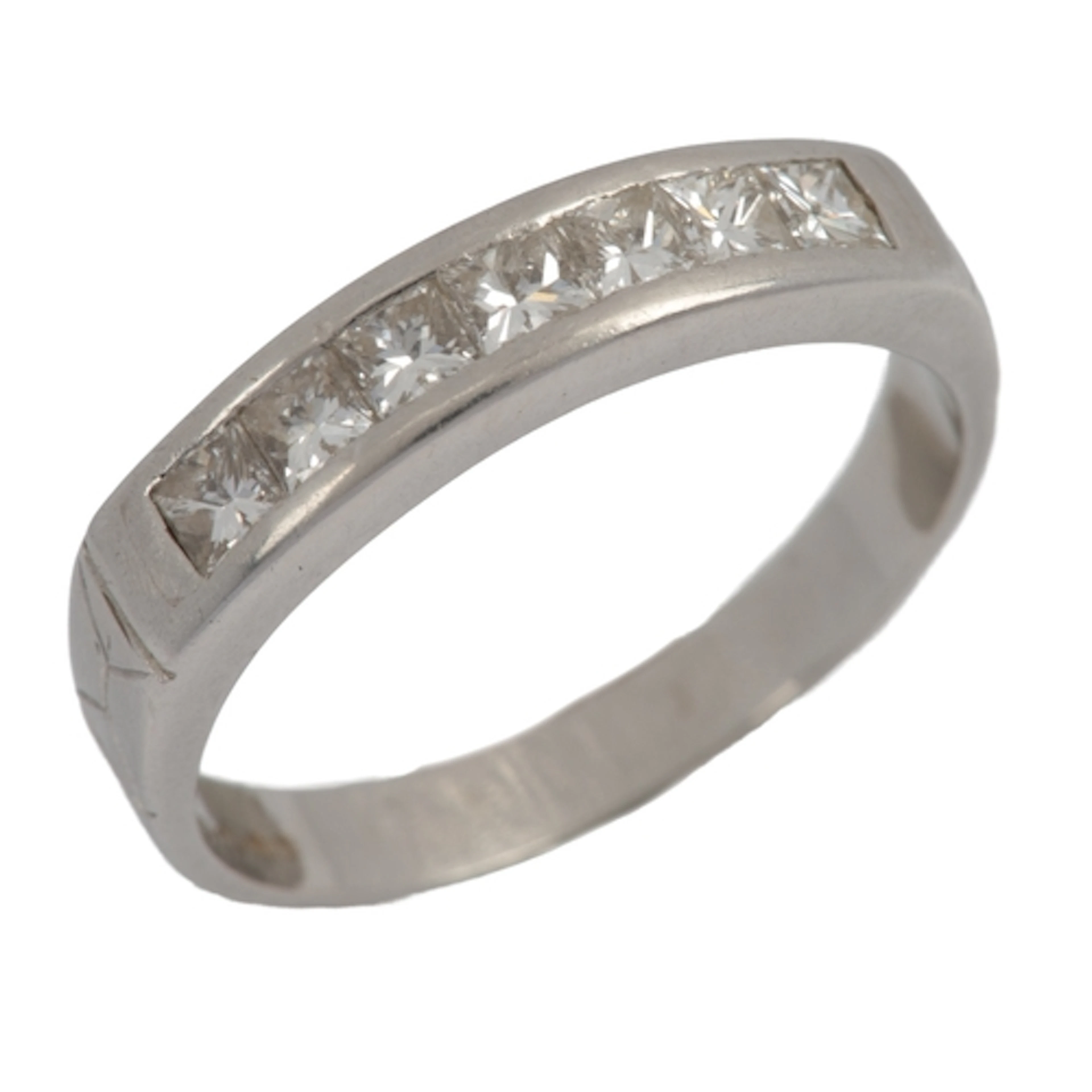 A diamond half eternity ring, channel-set to the front with ...