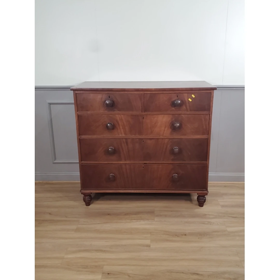 A mahogany Chest of Drawers fitted two short over three long...