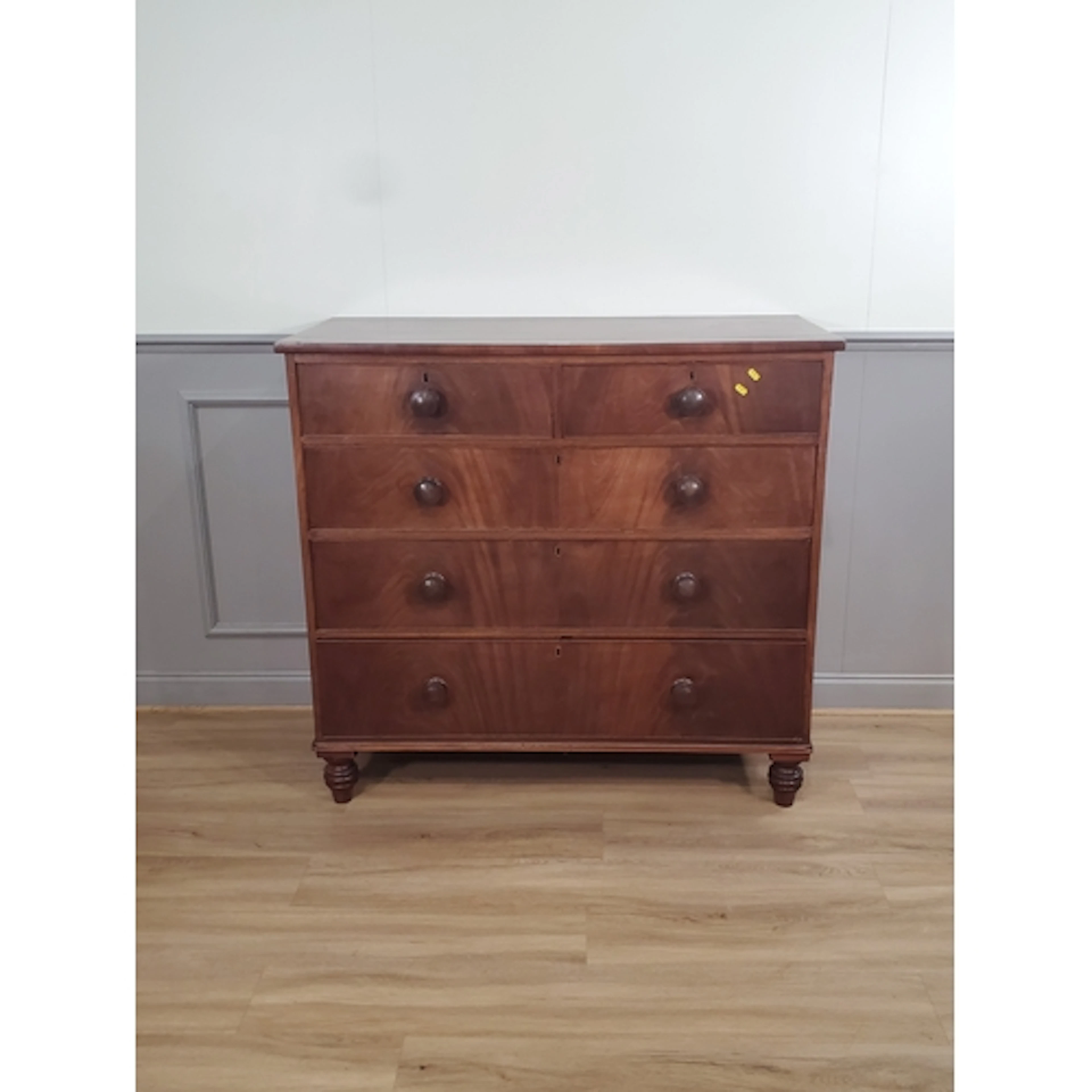 A mahogany Chest of Drawers fitted two short over three long...
