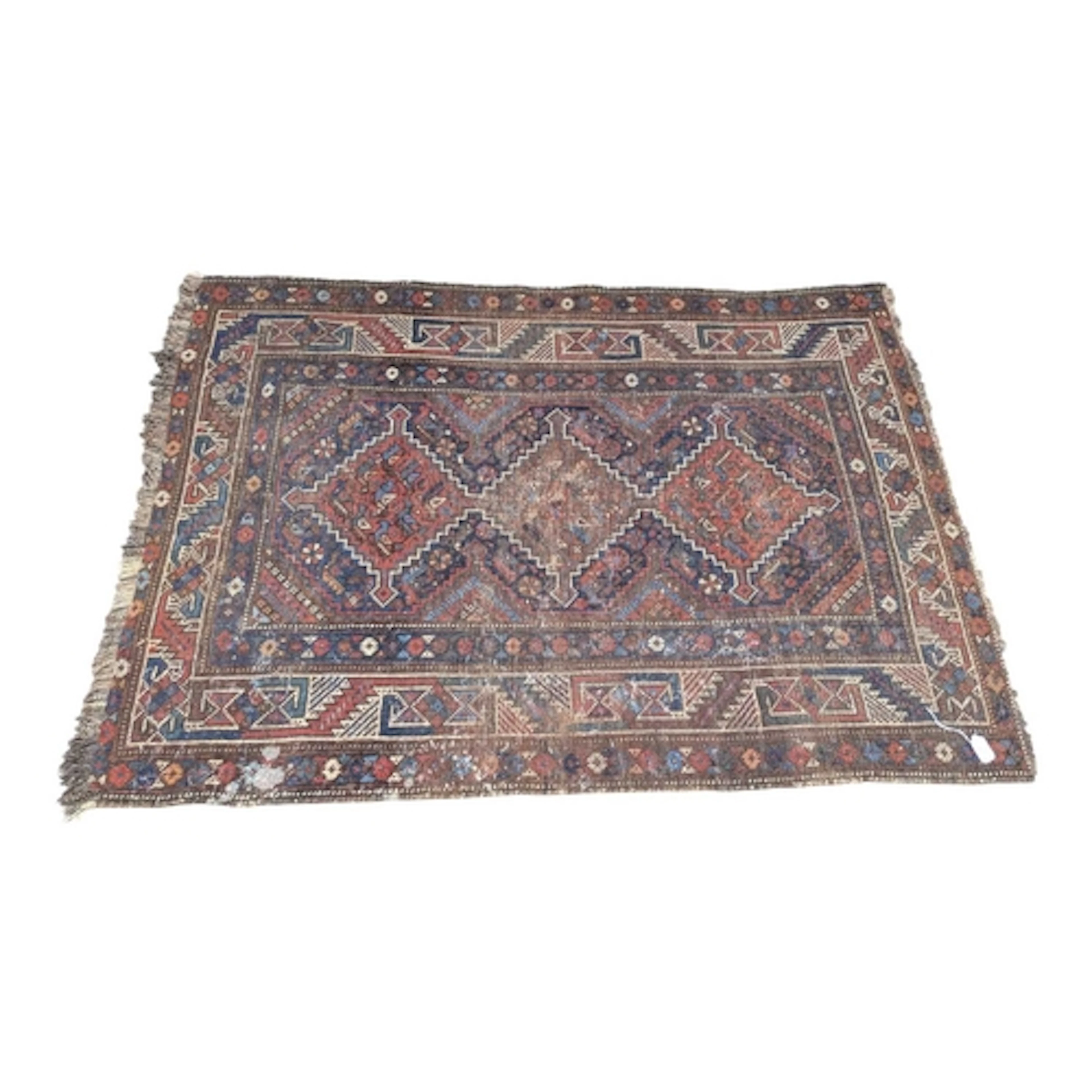 A 20th century Persian Islamic Qashqai carpet floor rug. Thr...