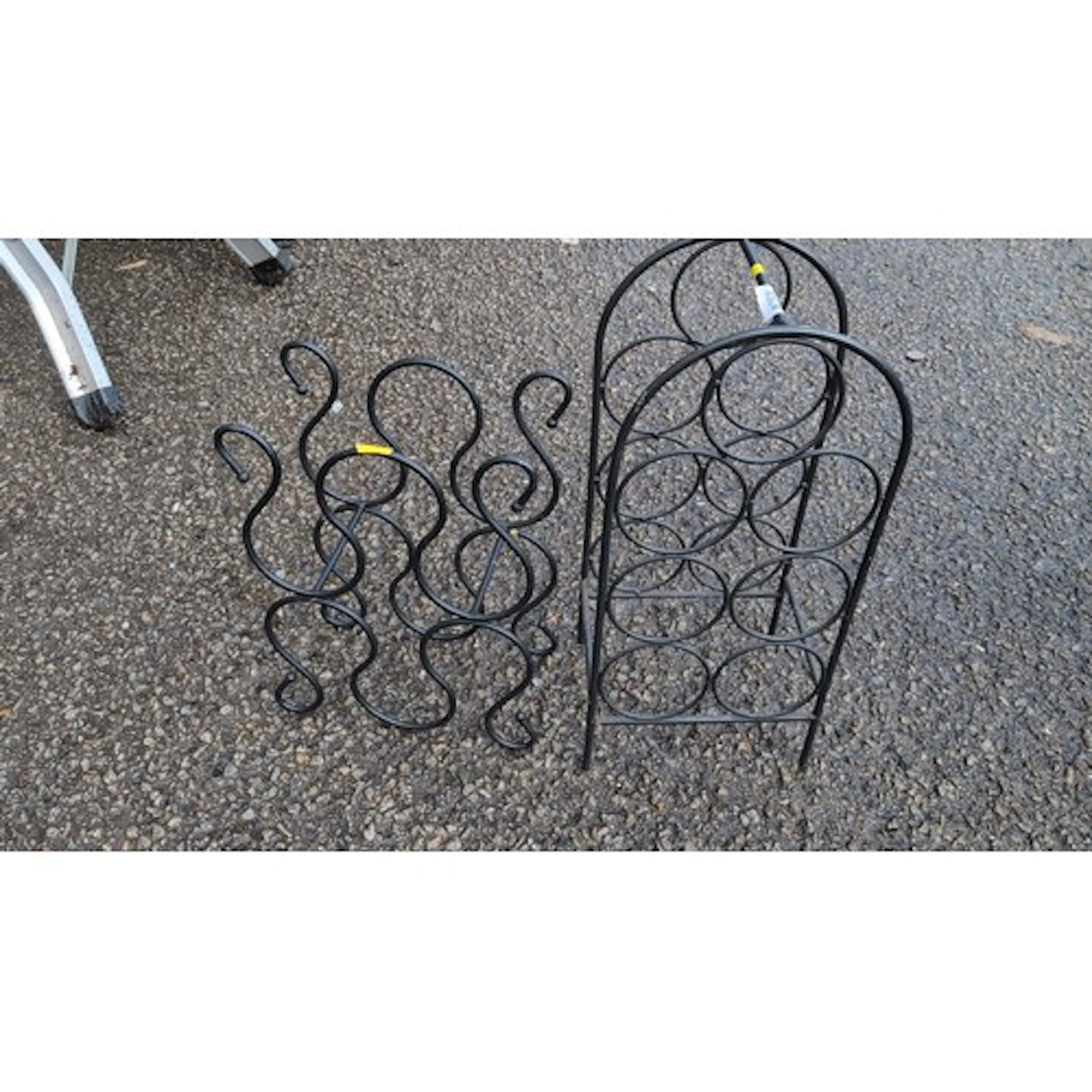 2 metal wine storage racks, comprising a freestanding tubula...