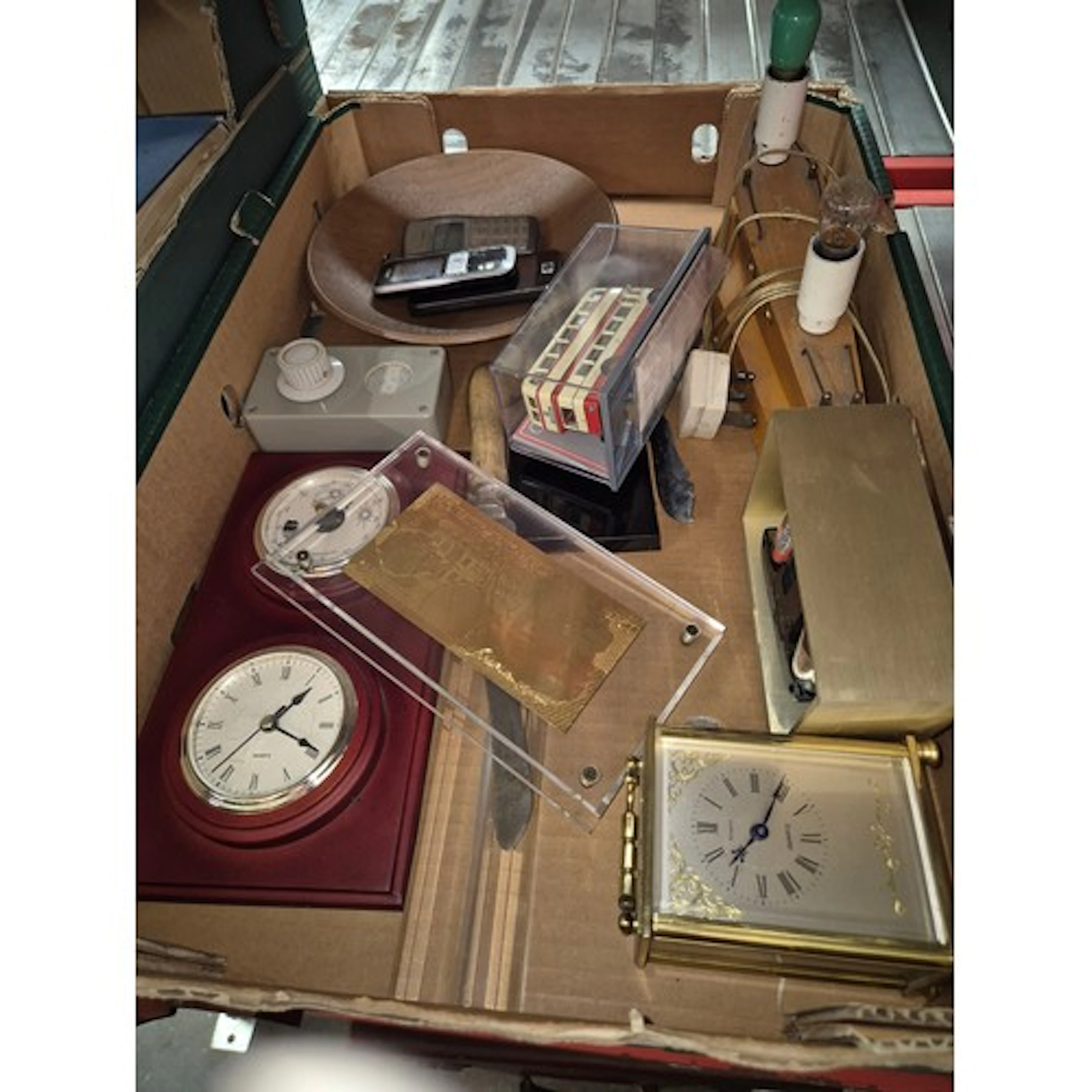 Various clocks, barometer, gold £50 note in perspex, mobile ...