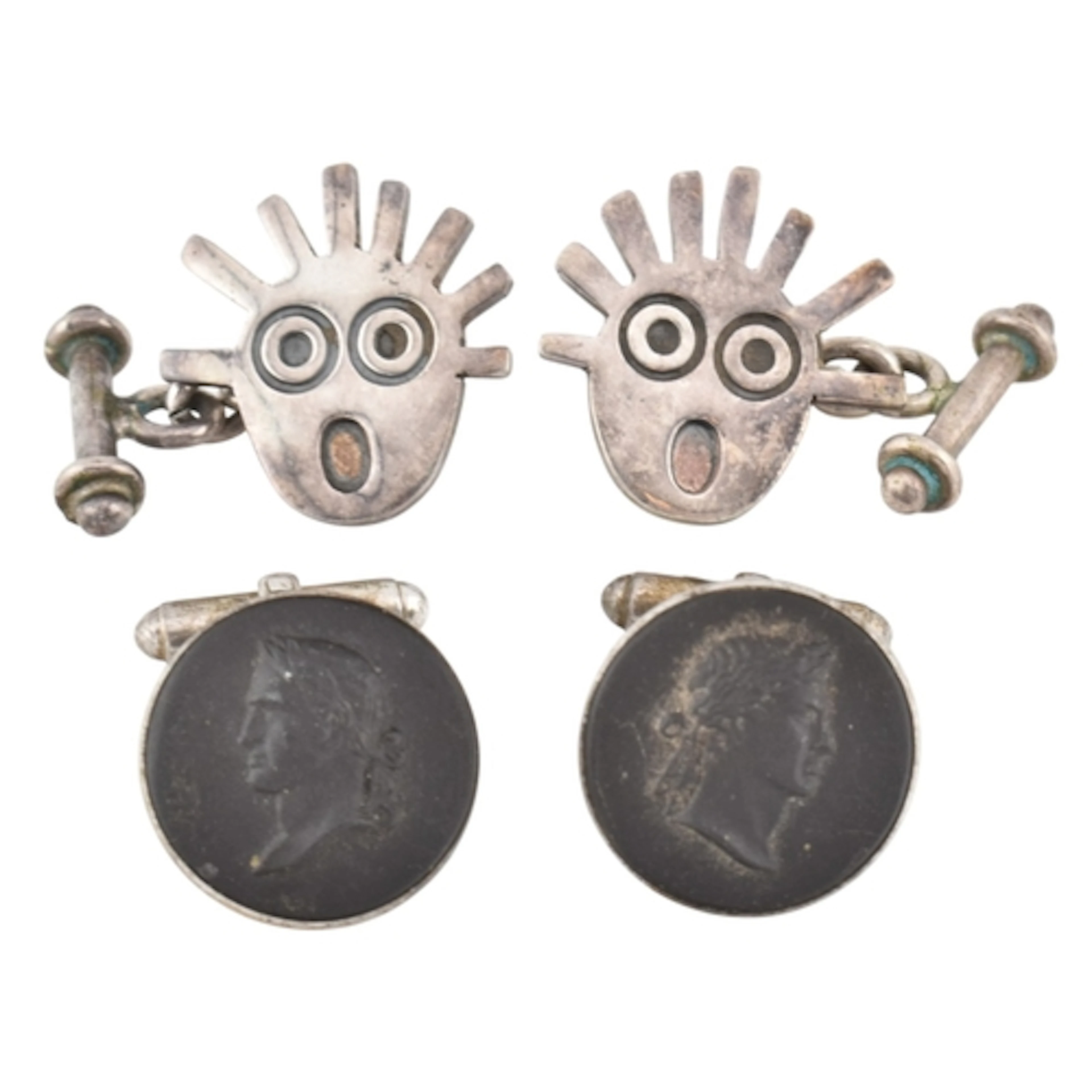 Two pairs of silver cufflinks. The cufflinks to include a pa...
