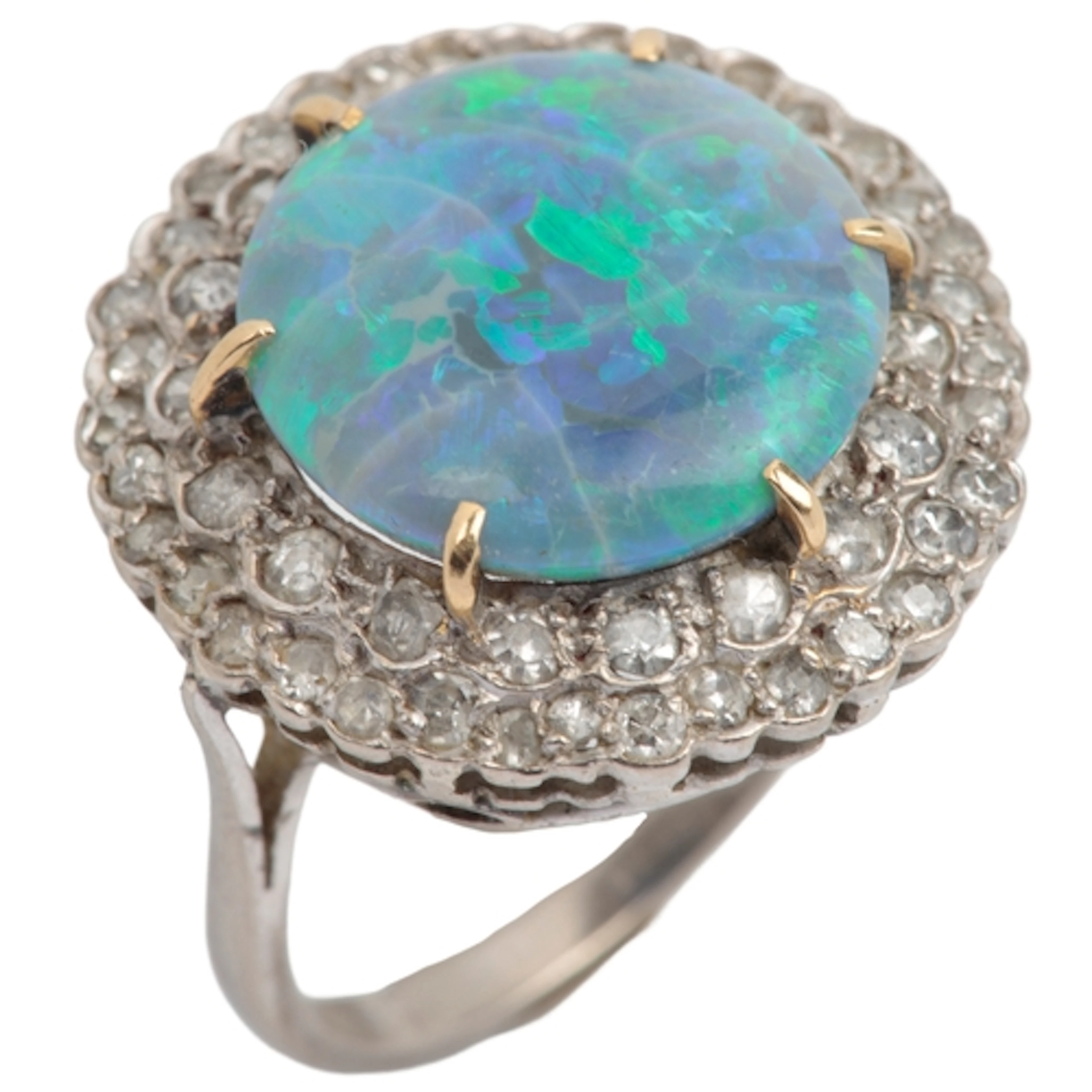 An opal and diamond cluster ring, claw-set with a circular b...
