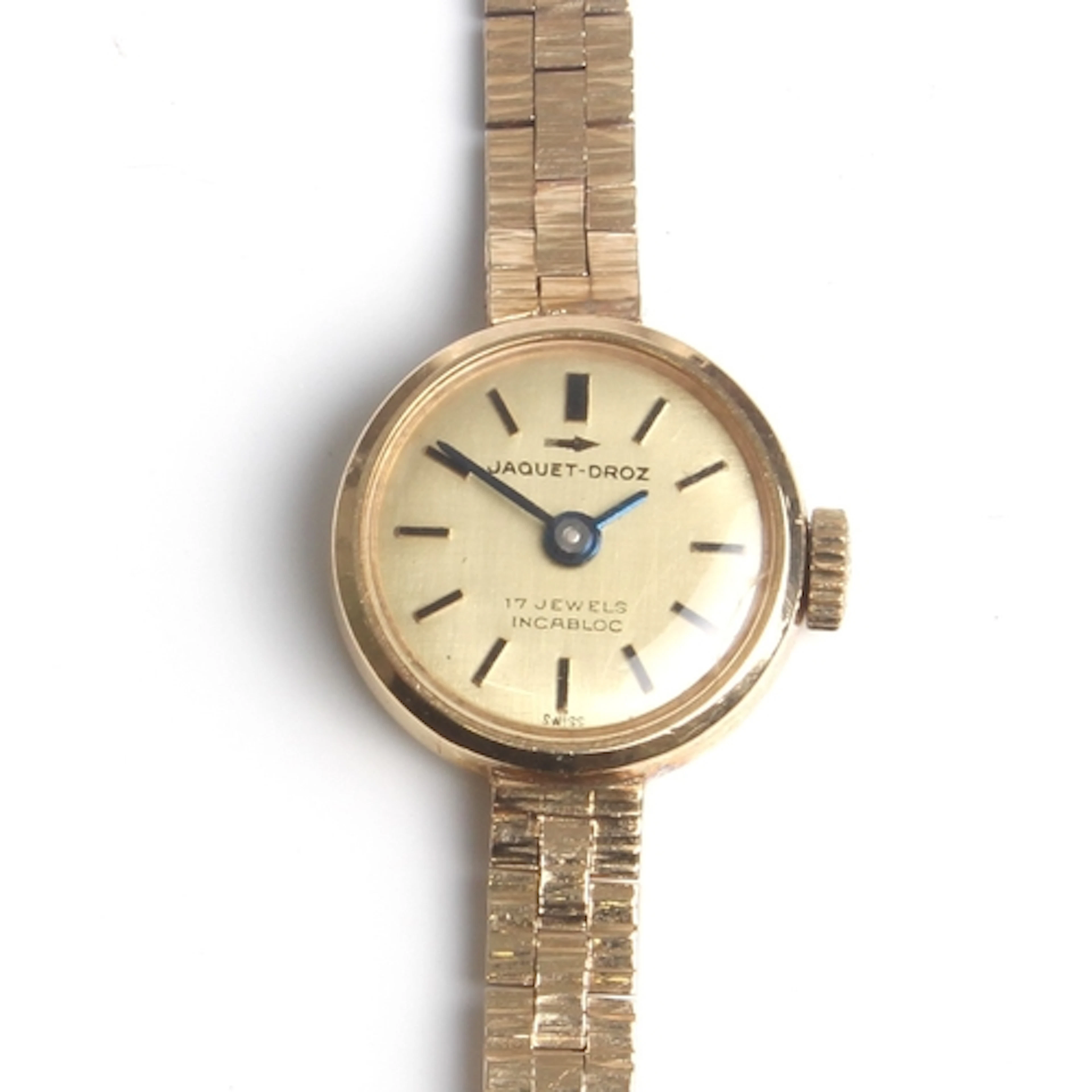 A vintage 9ct gold ladies manual wind wrist watch by Jacquet...