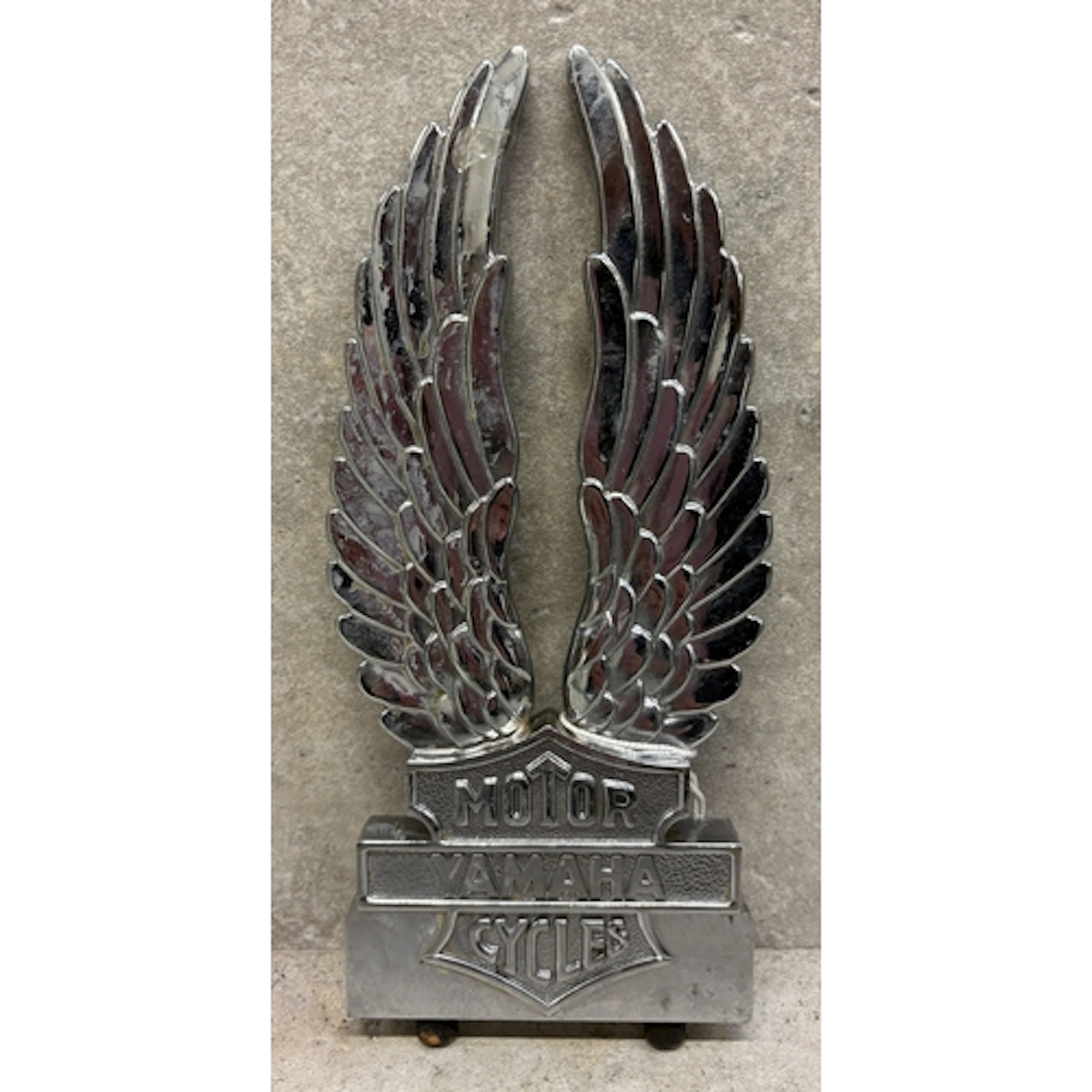 A vintage chrome Yamaha Motorcycles sissy bar badge. Est. £2...