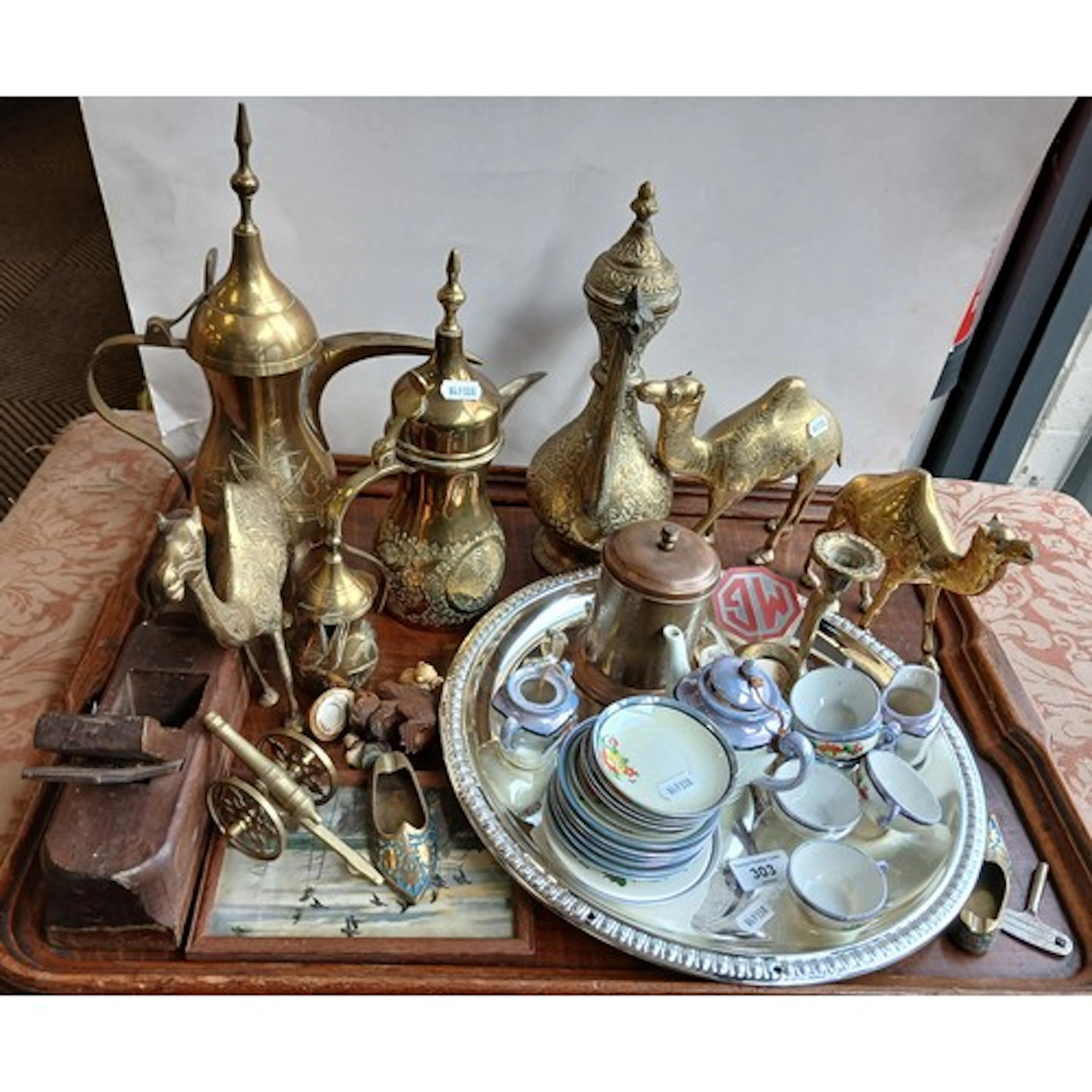 Collection of brass ware to include Camels, coffee pots, cob...
