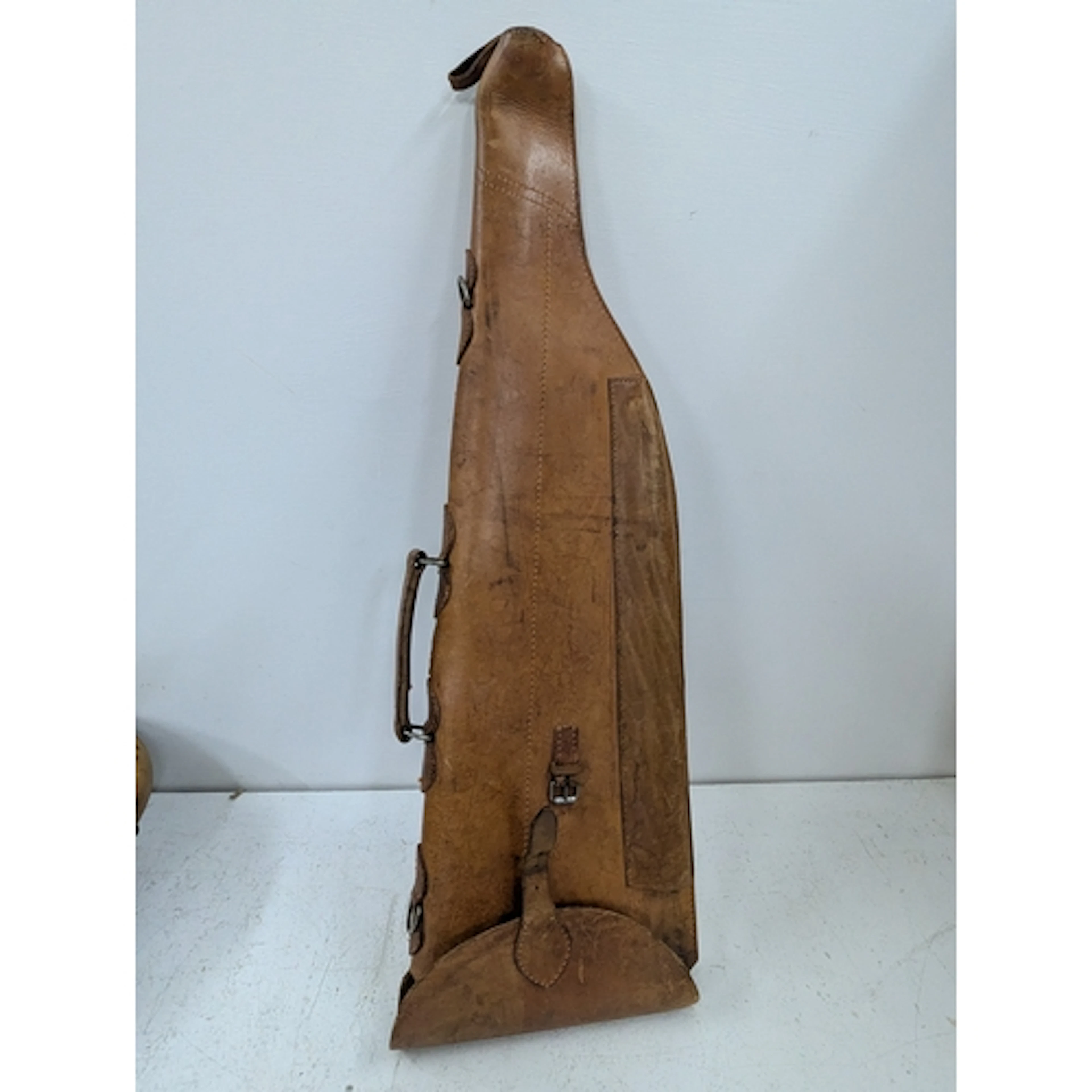 A brown leather leg of mutton shot gun case Location: If the...