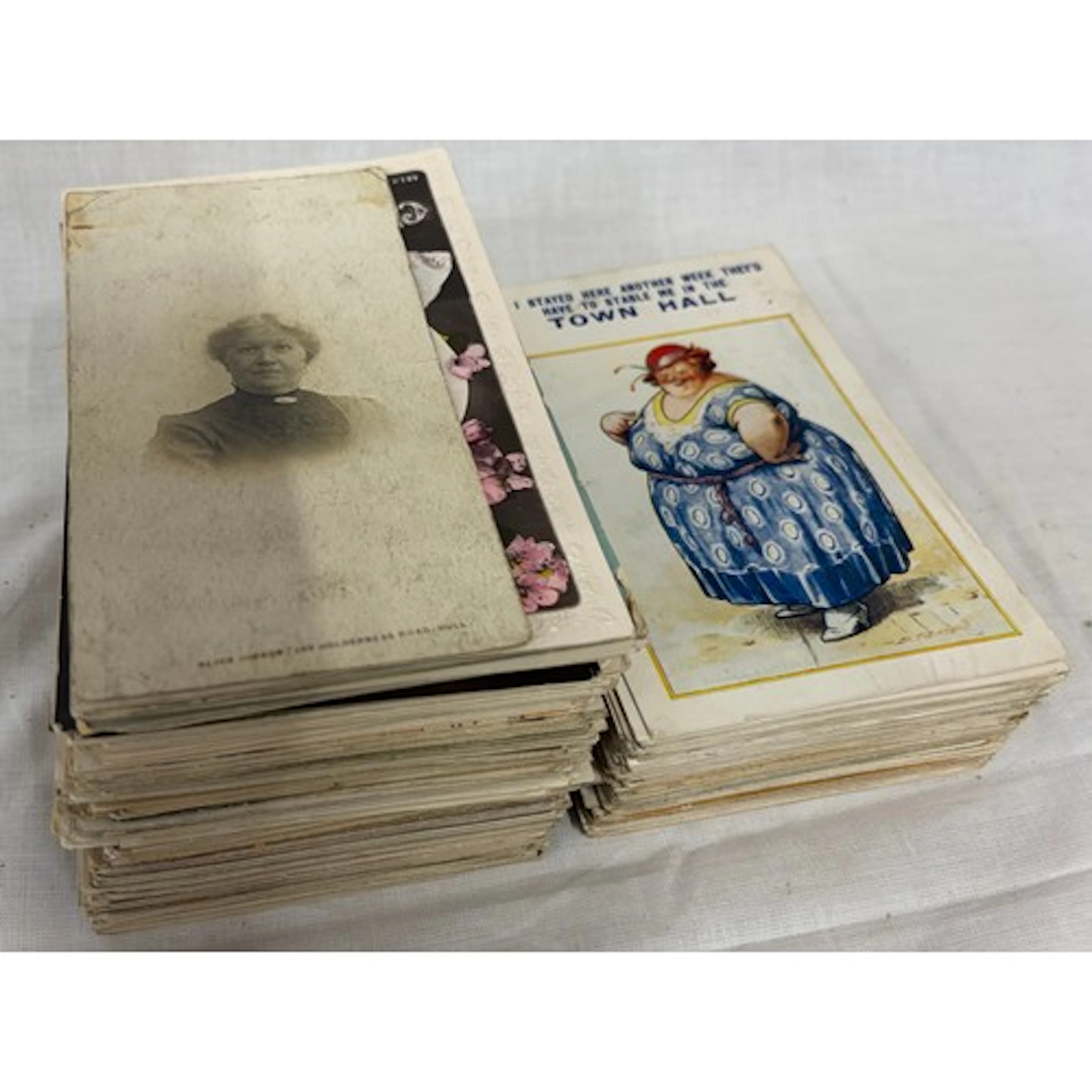 A collection of Edwardian to 1950's postcards to include 73 ...