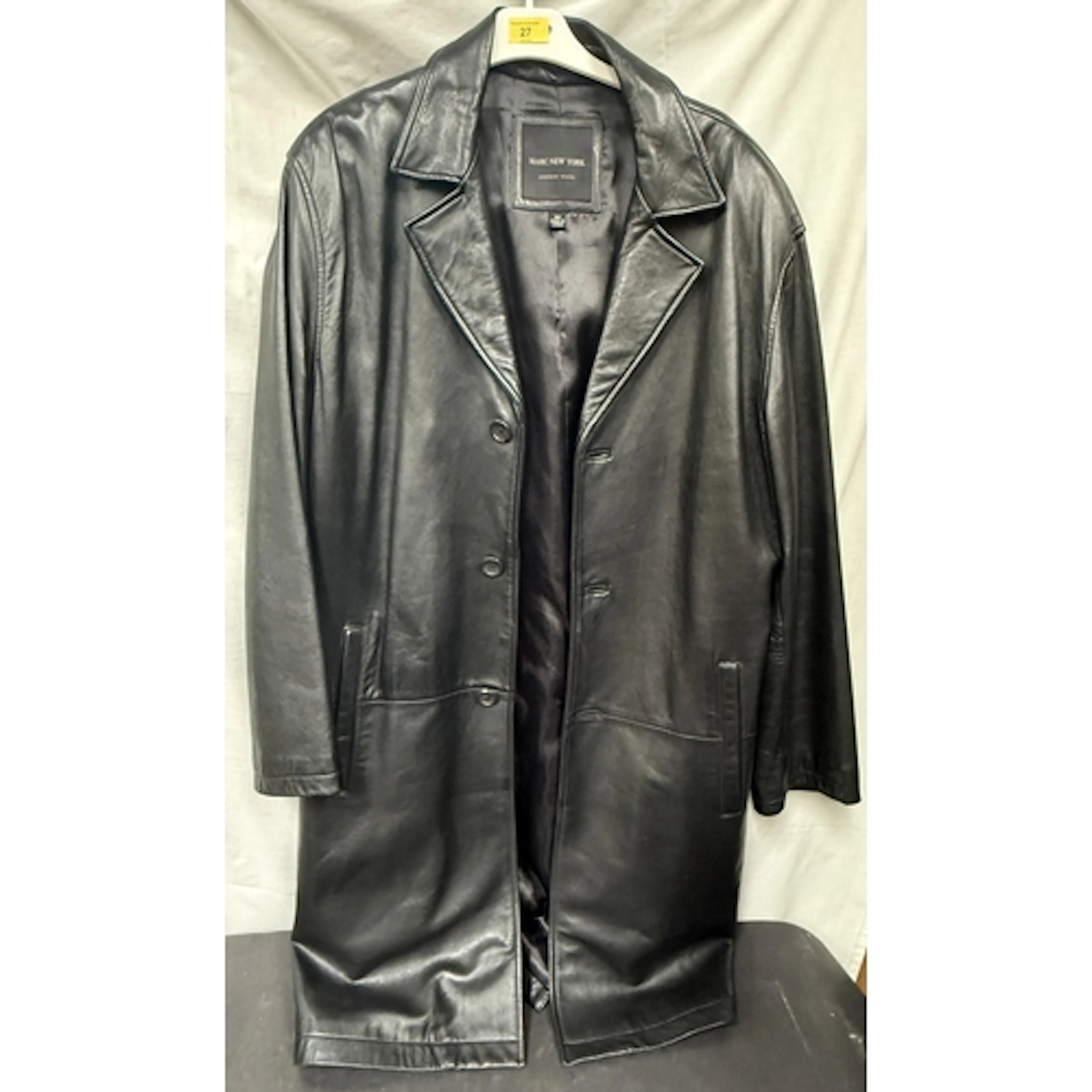Gentleman's fashion, Andrew Marc: a black leather duster jac...