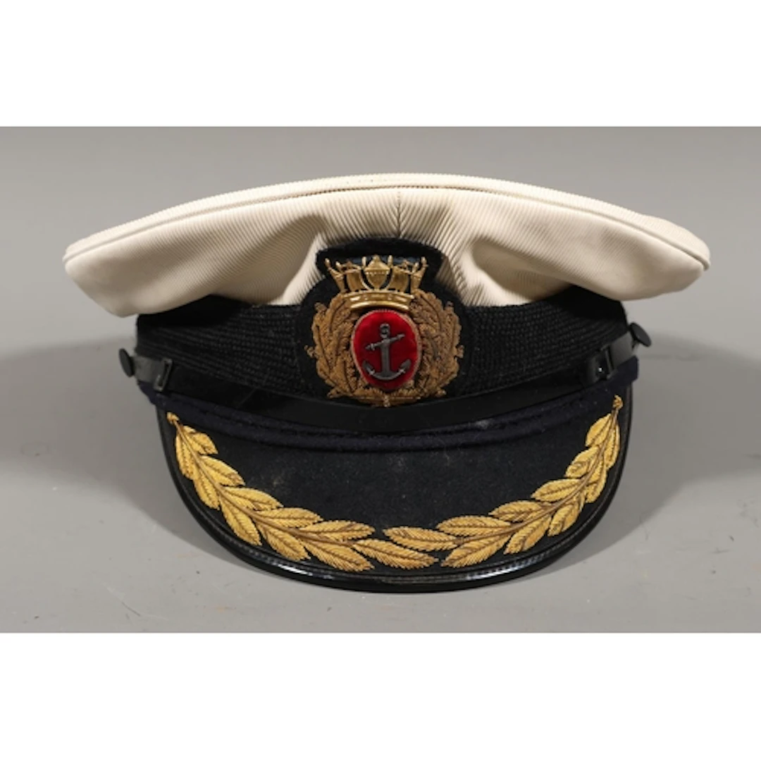 Captain's naval hat with wreath to peak and insignia to fron...