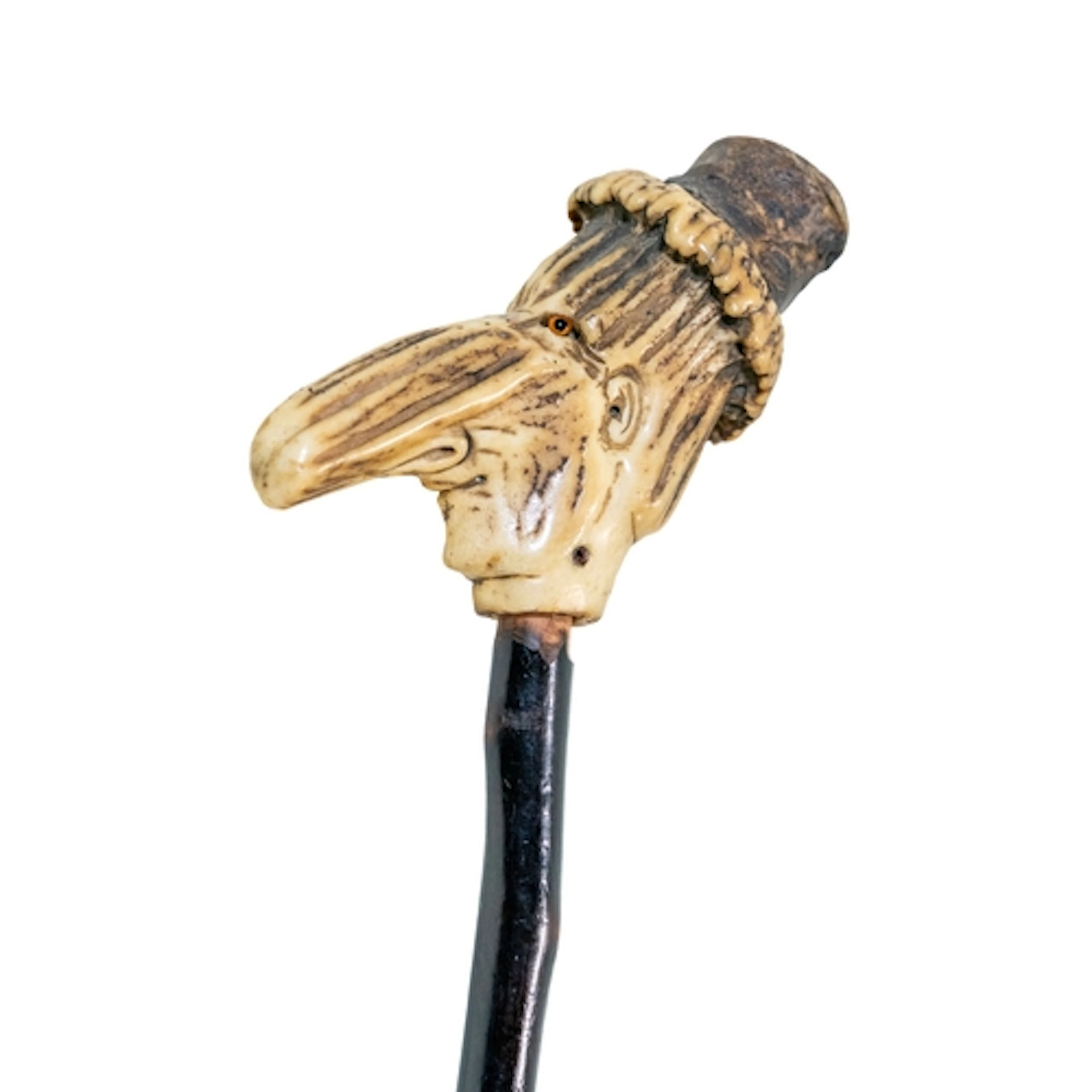 A Victorian carved stag antler figural walking cane, carved ...