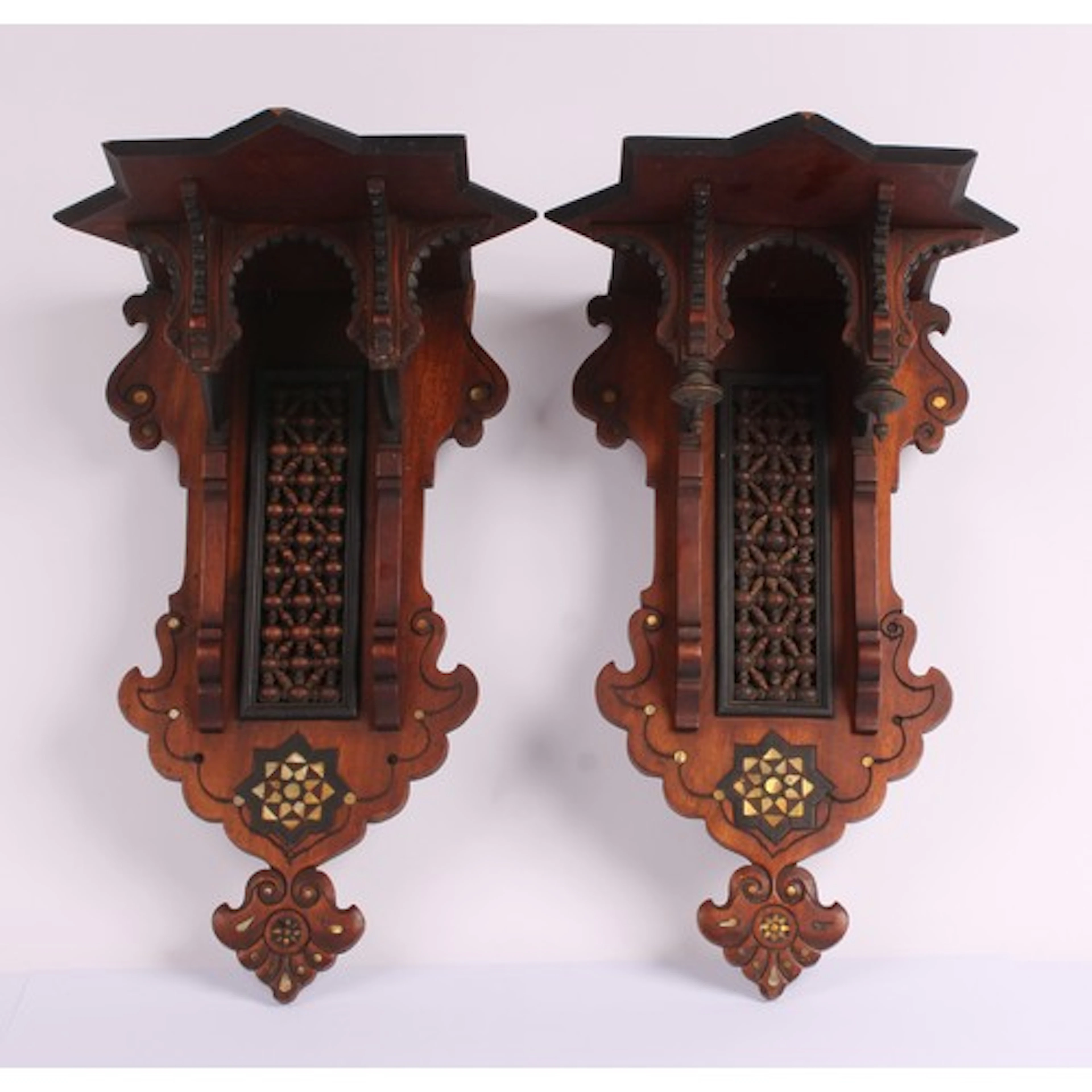 A pair of Moorish hardwood, mashrabiya, and ebony and mother...