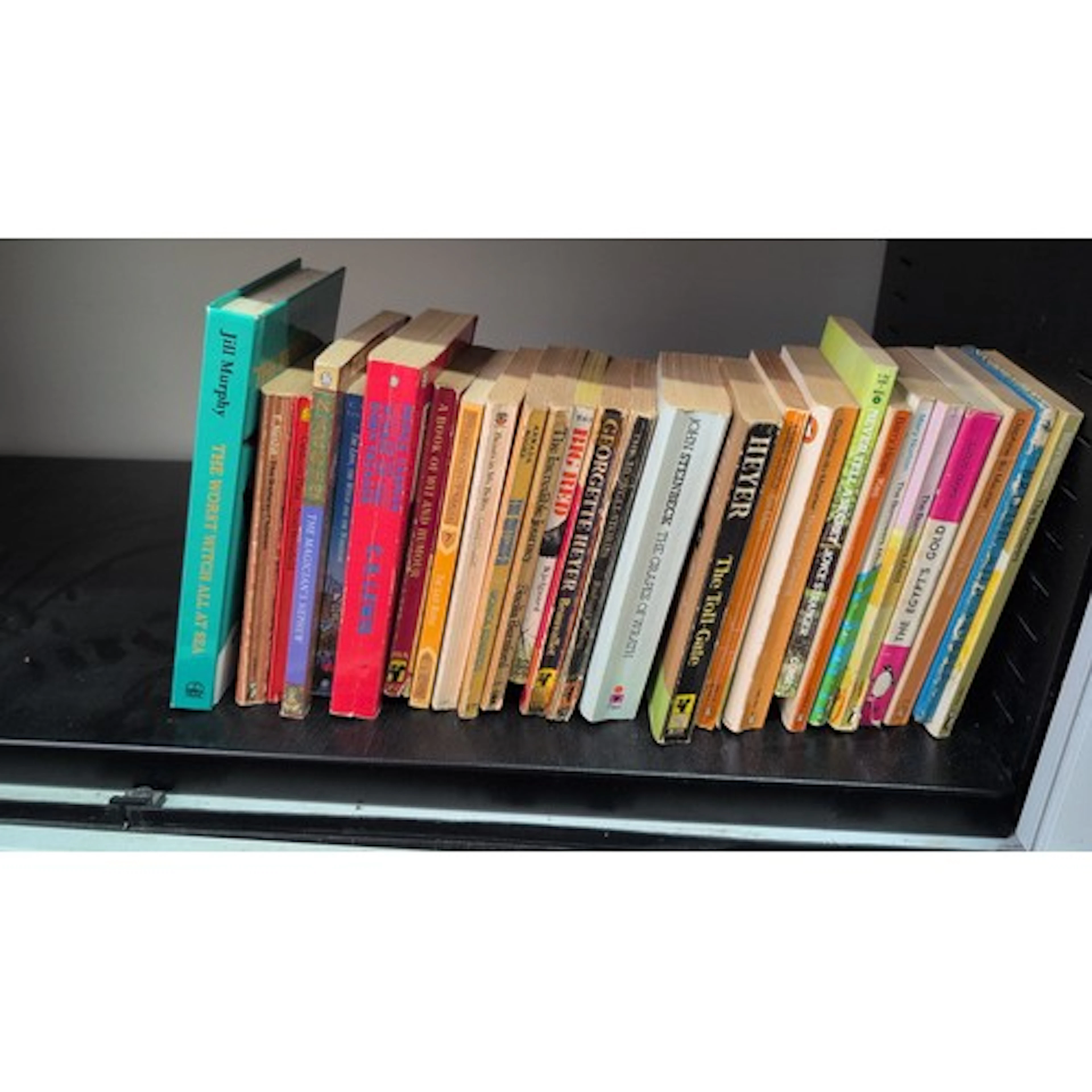 A quantity of paperback fiction and children’s literature, i...