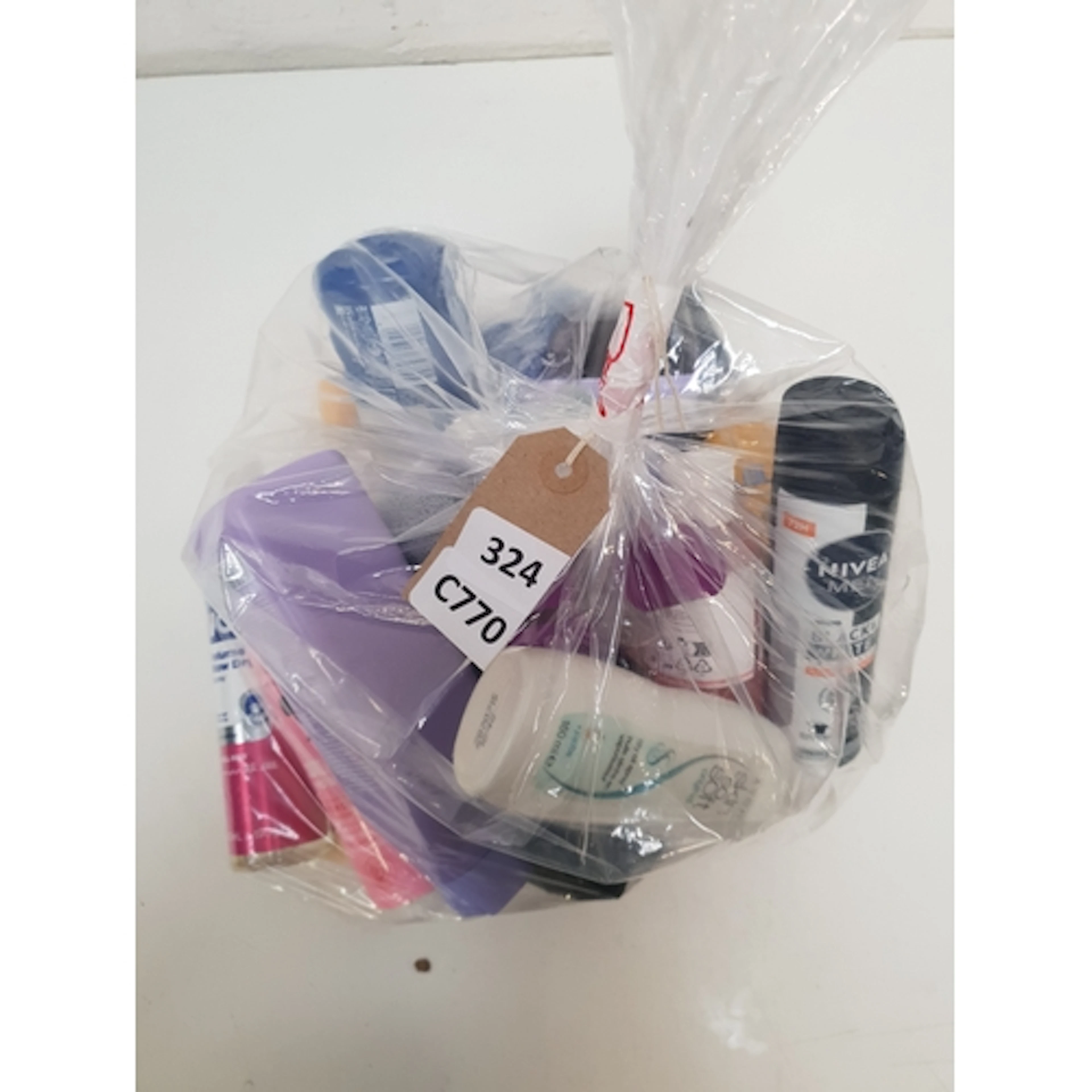 ONE BAG OF USED COSMETICS including Nivea and VO5