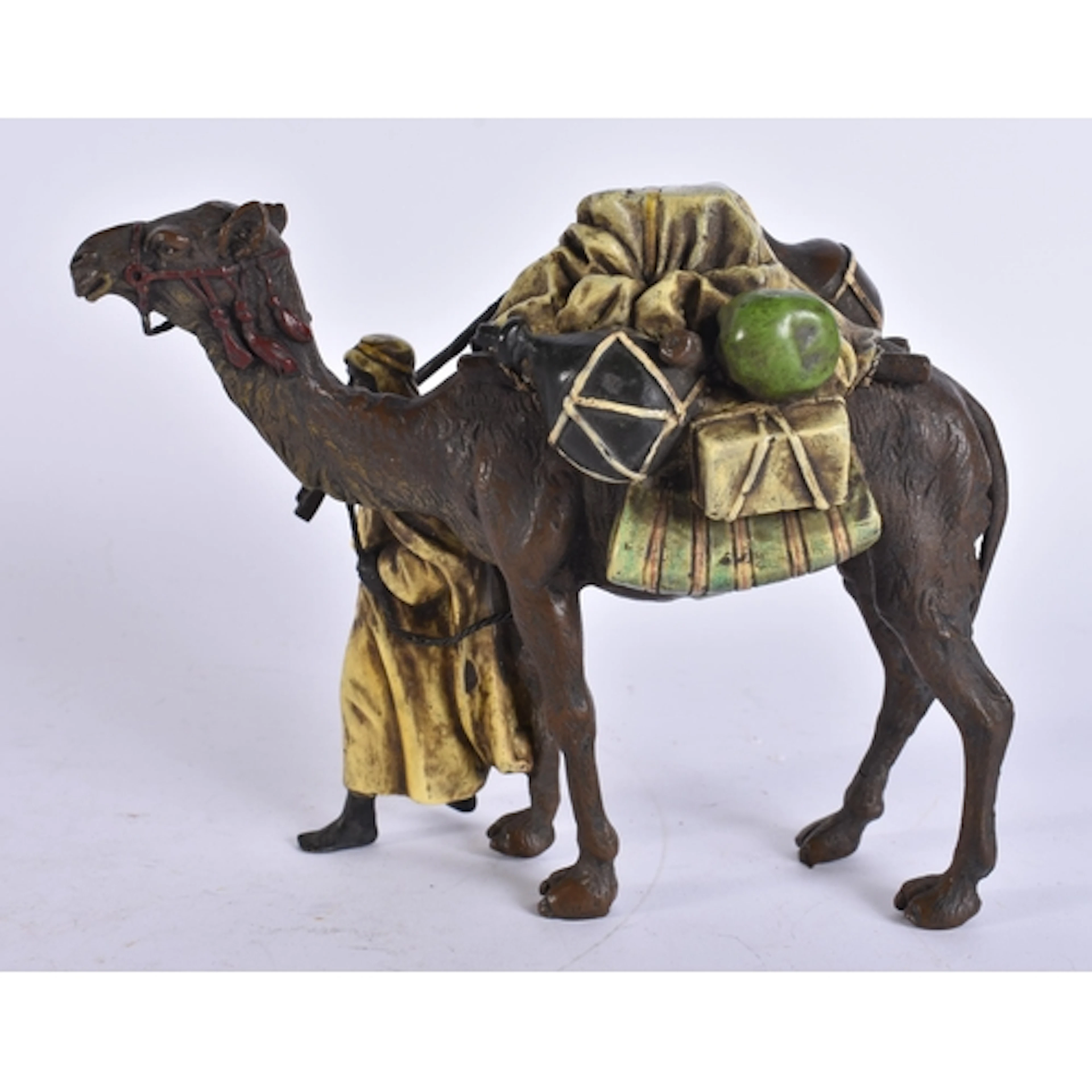 A COLD PAINTED BRONZE ARABIC CAMEL GROUP. 14 cm x 12 cm.