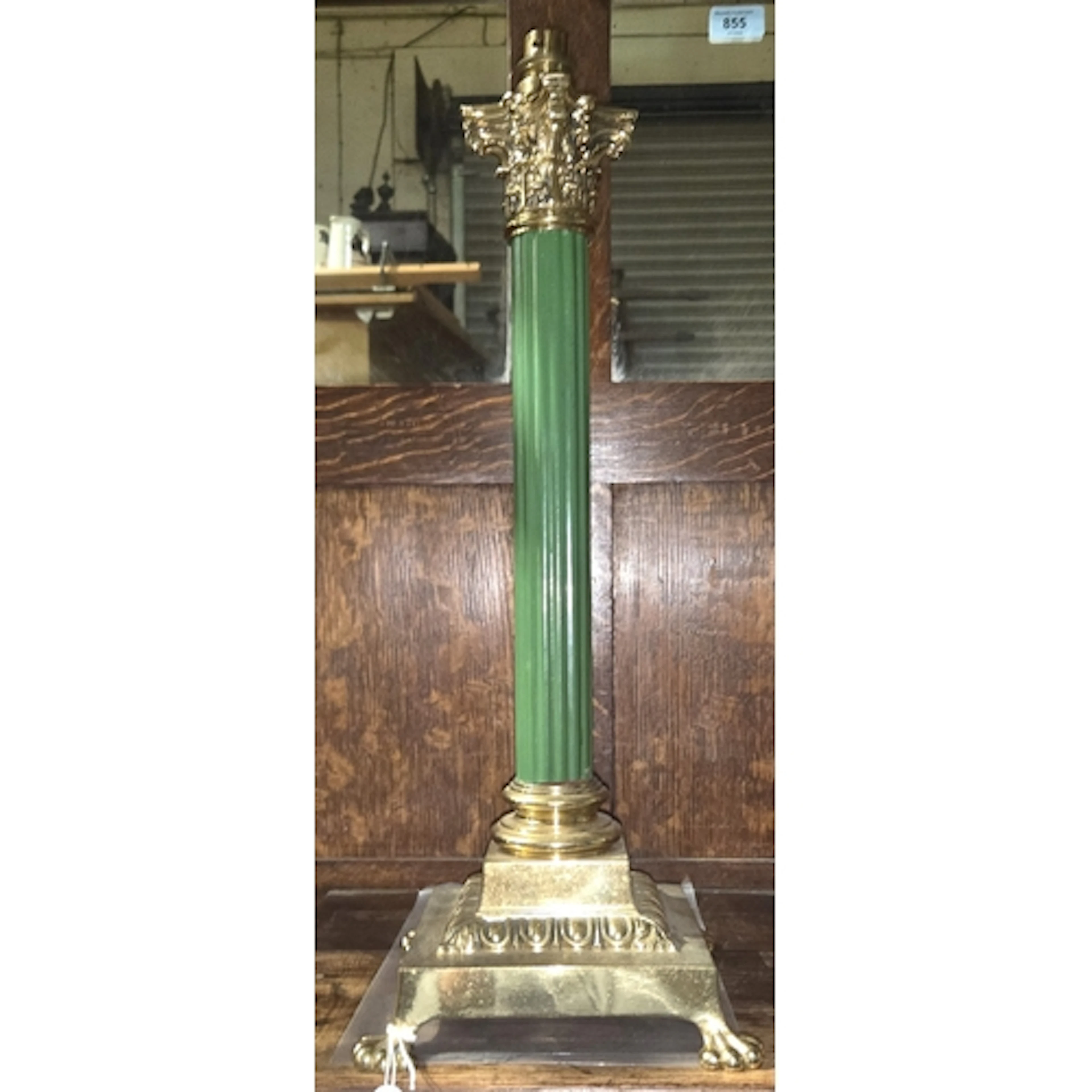 A VINTAGE LAMP BASE, brass mounted Corinthian column with co...