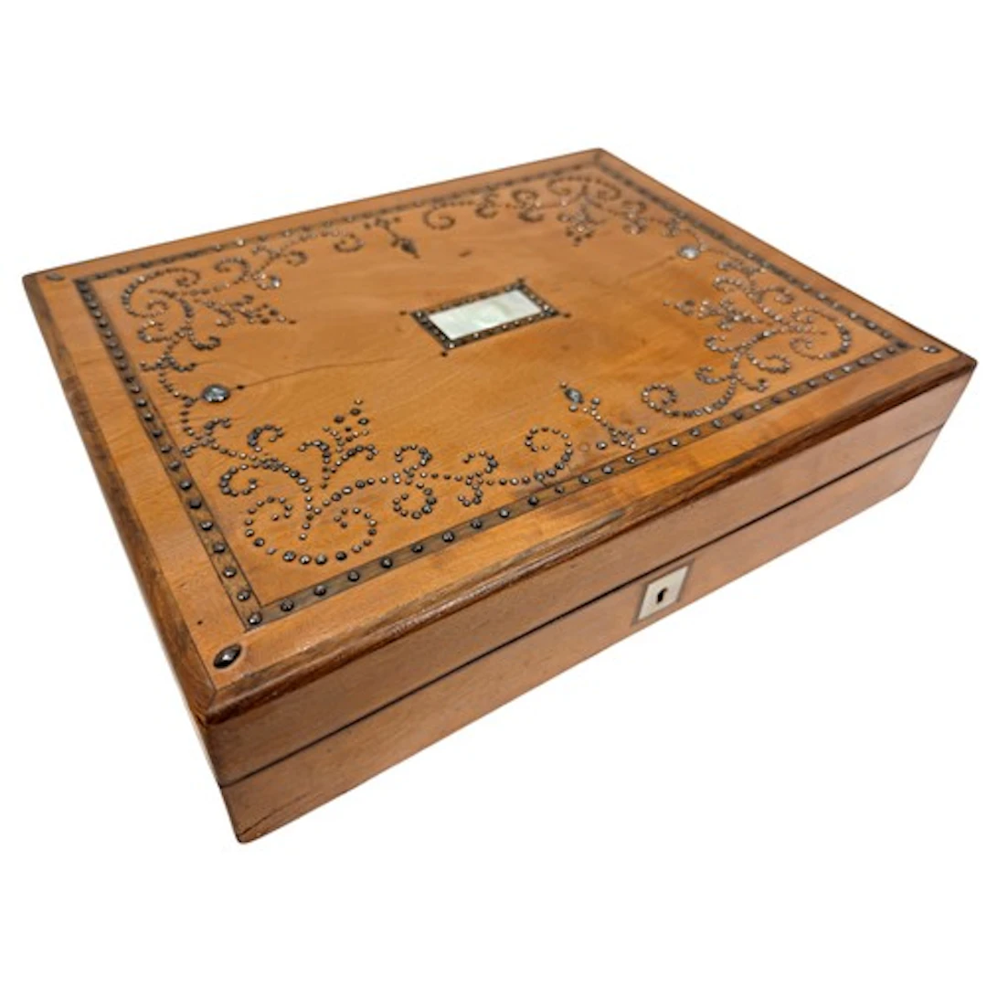 A 19th Century satinwood games box, the hinged cover decorat...