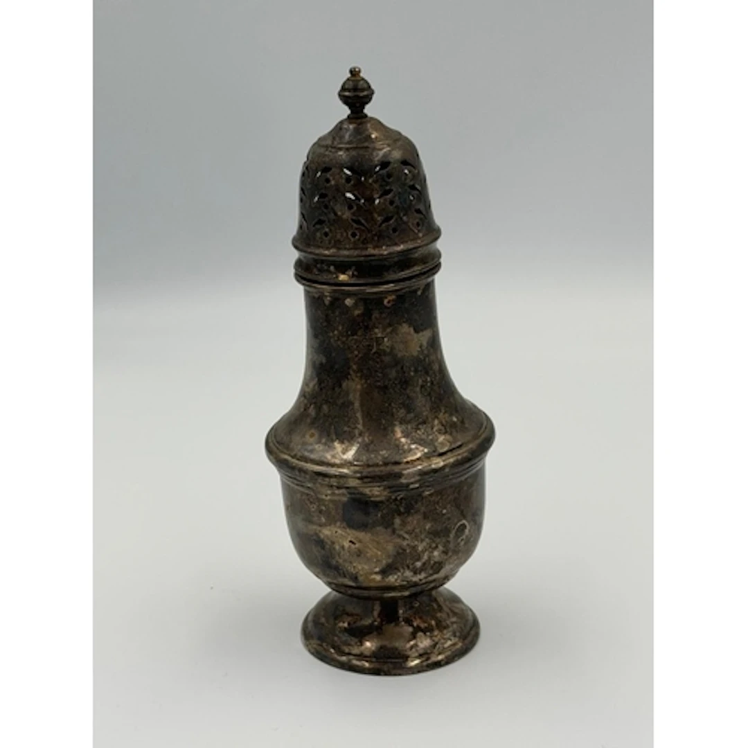 A hallmarked silver sugar sifter hallmarked for Birmingham b...