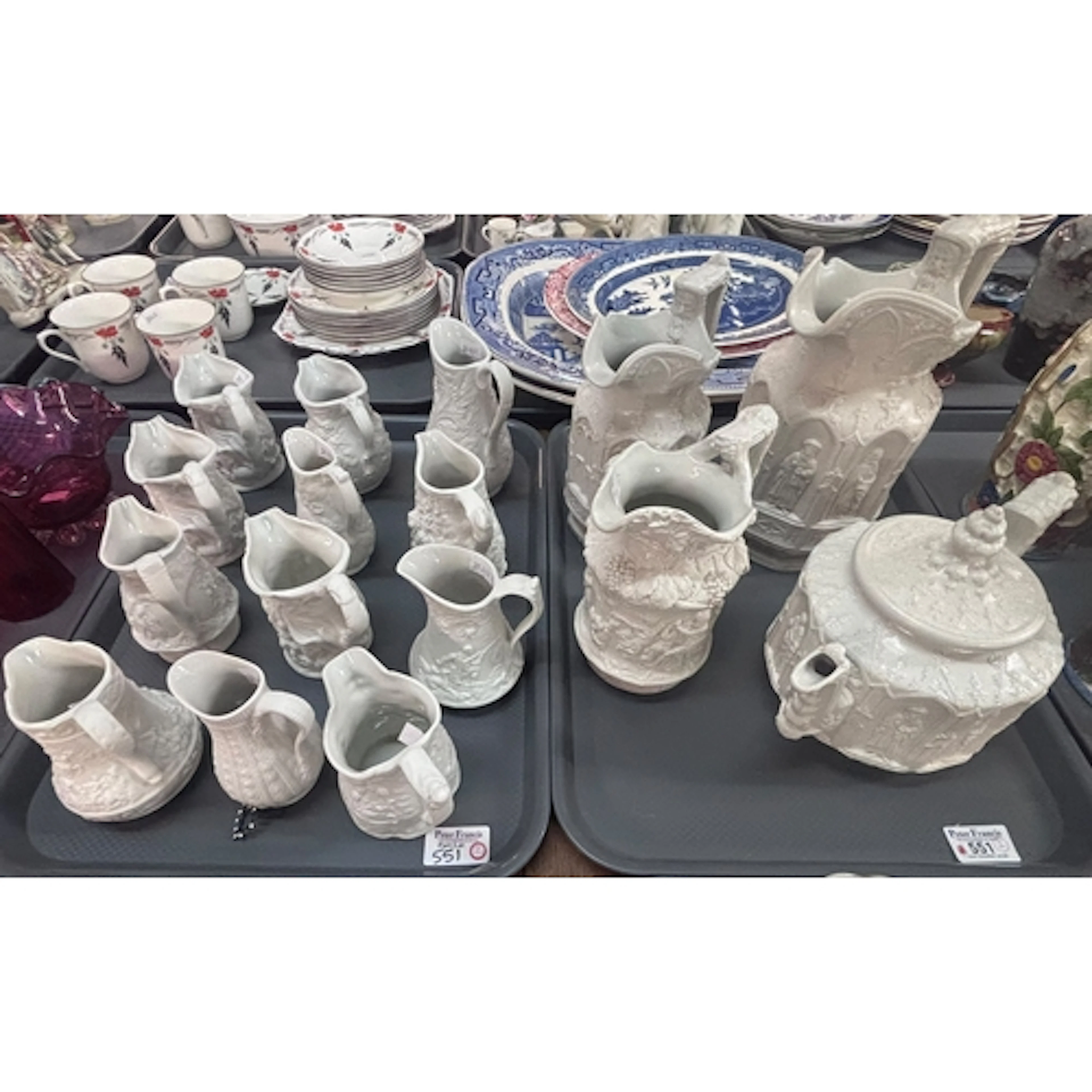 Tray of mainly Portmeirion Parian ware relief moulded jugs, ...
