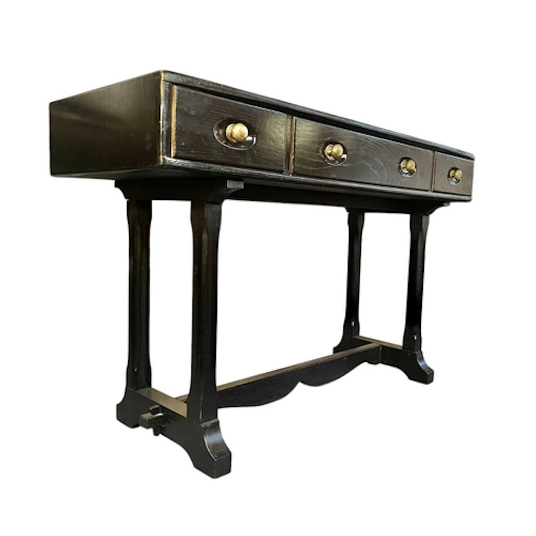 Ercol Furniture - a retro 20th century black-painted beech a...