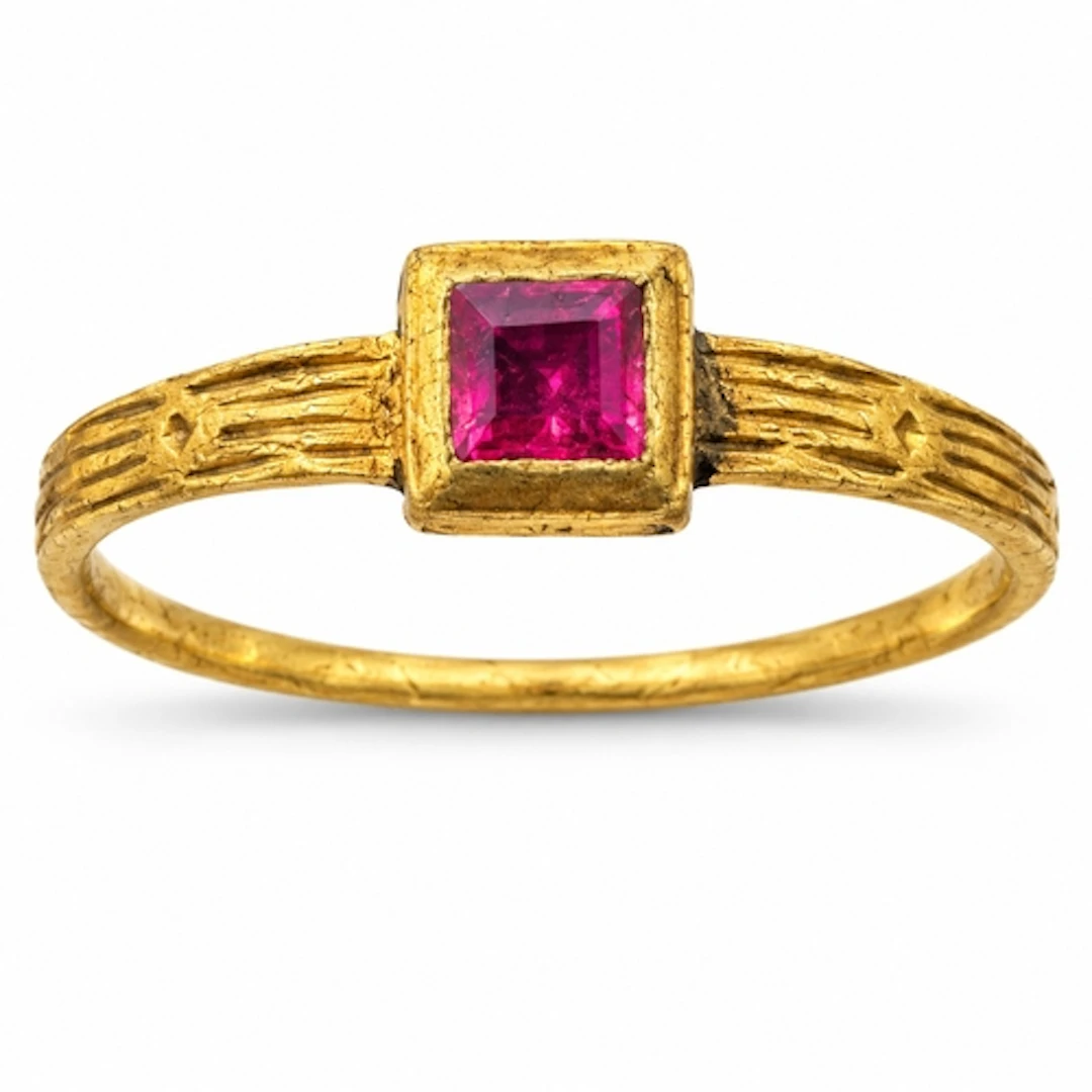 A Renaissance gold ring set with a rectangular faceted ruby ...