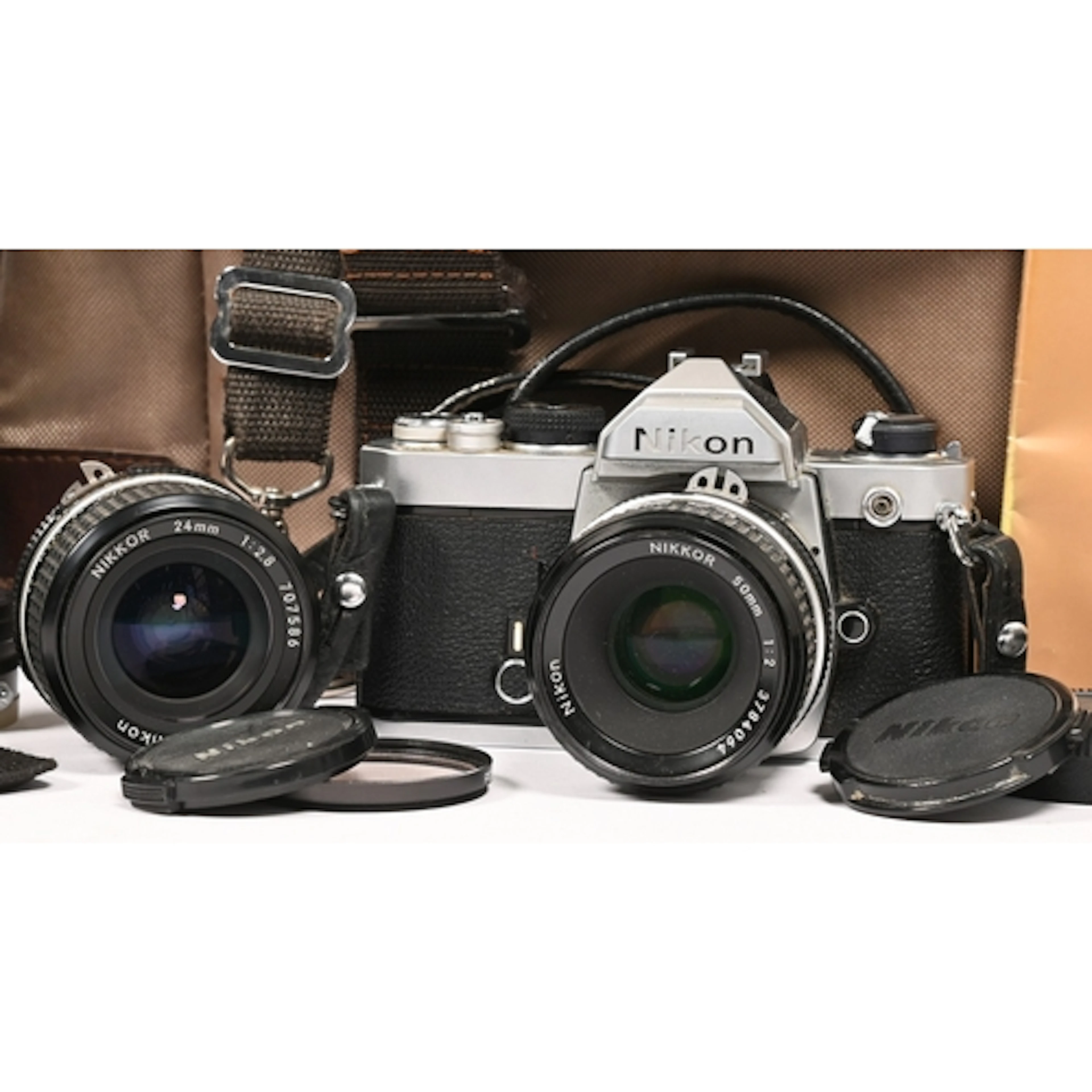 Photography. A Nikon FM3010282 camera, with instruction manu...