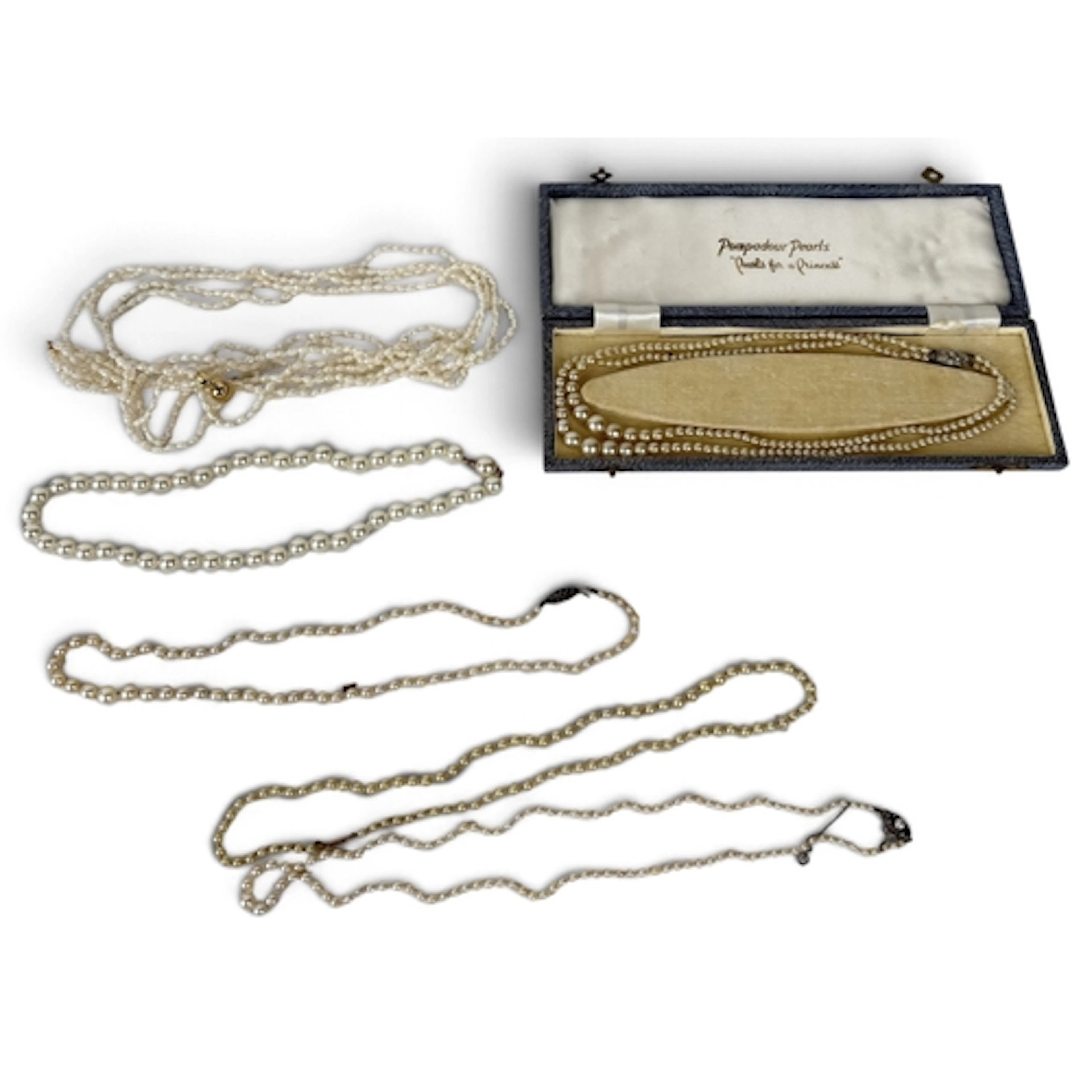 A GROUP OF PEARLS TO INCLUDE A NECKLACE WITH SILVER MOUNTS...
