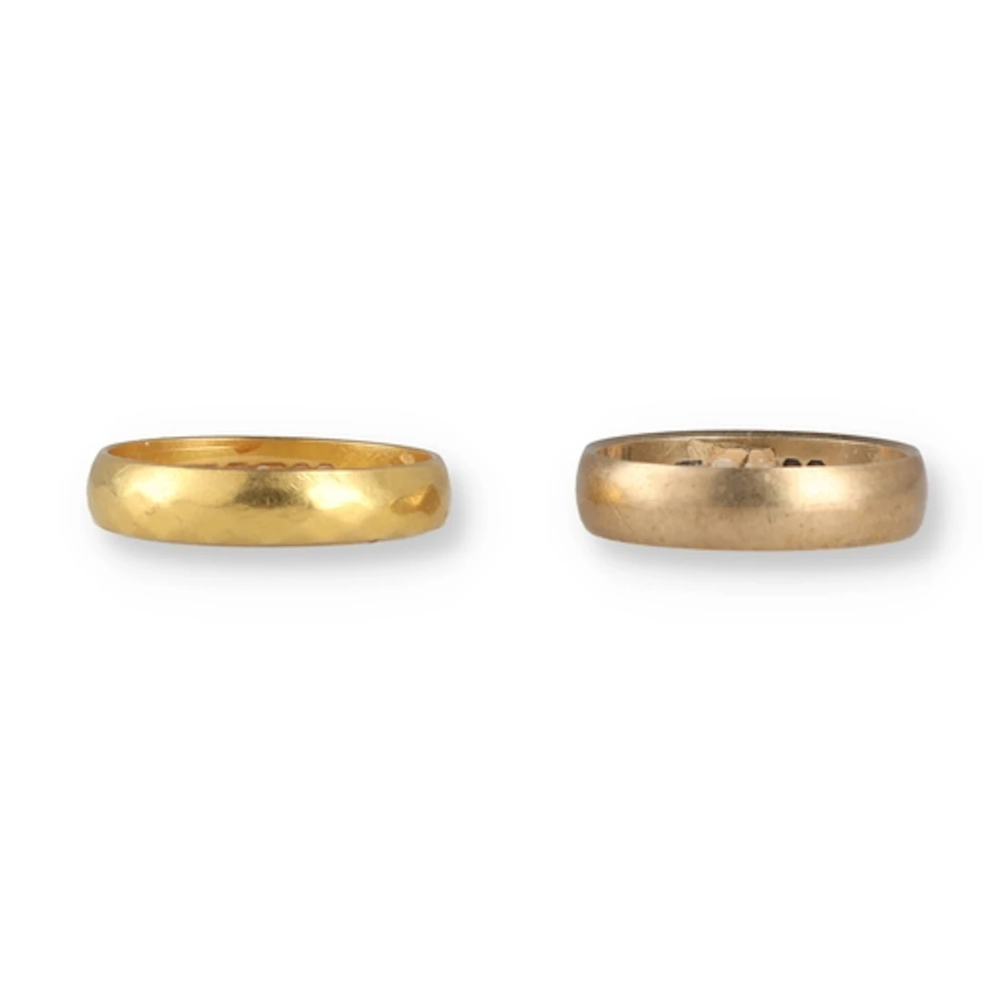 TWO GOLD WEDDING BANDS (2) Total weight: 5.6gms ...