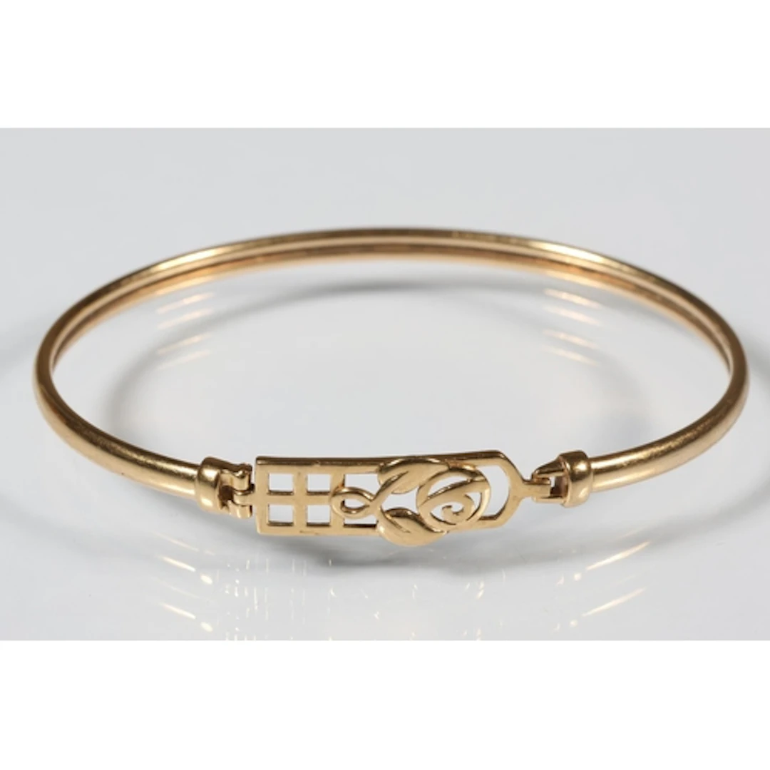 9ct gold bangle with Charles Rennie Mackintosh rose design c...