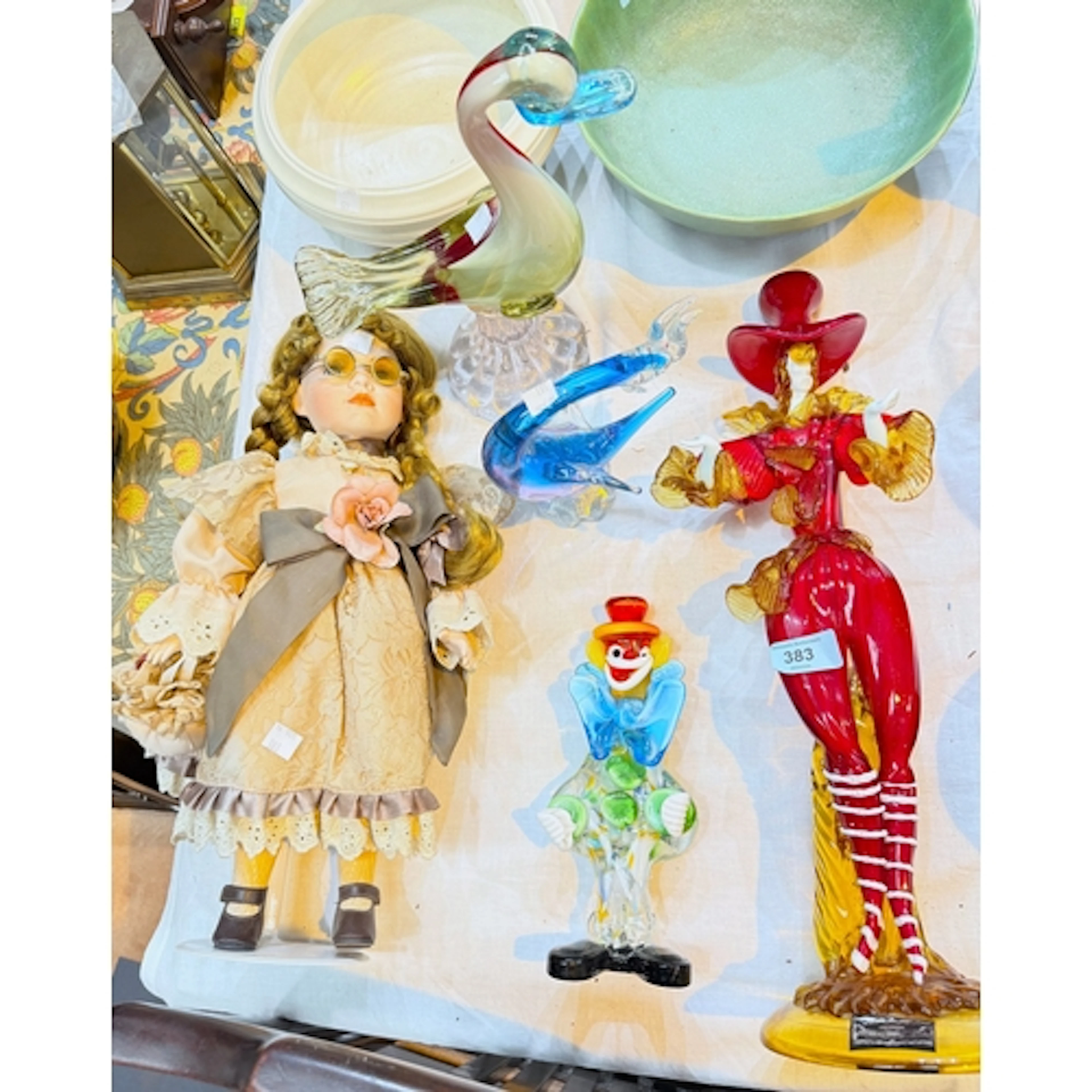 A large Murano dancer in top hat, three further pieces of Mu...