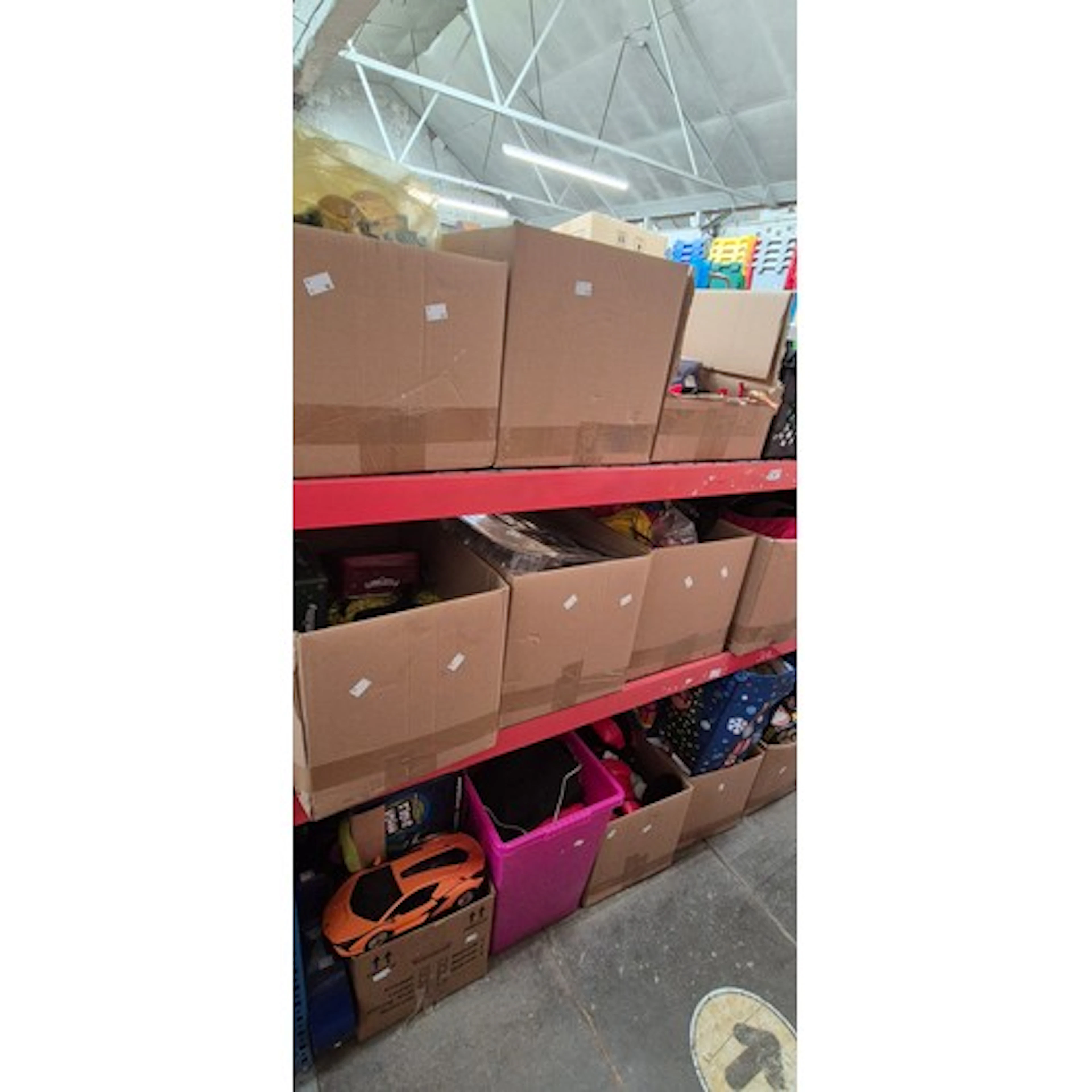 15 boxes and a bag of toys including Nerf guns, jigsaw puzzl...