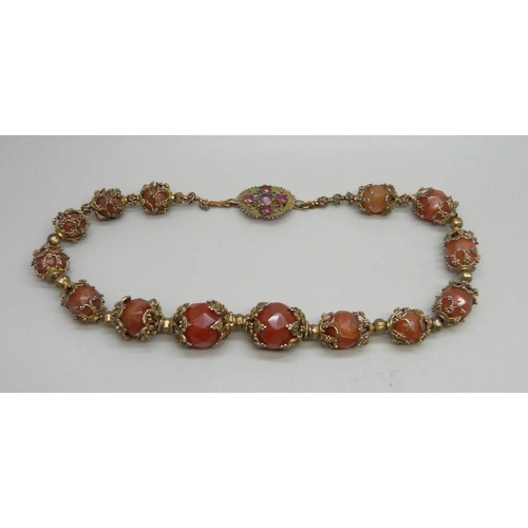 A Sri Lankan gilt on white metal agate bead necklace, the cl...